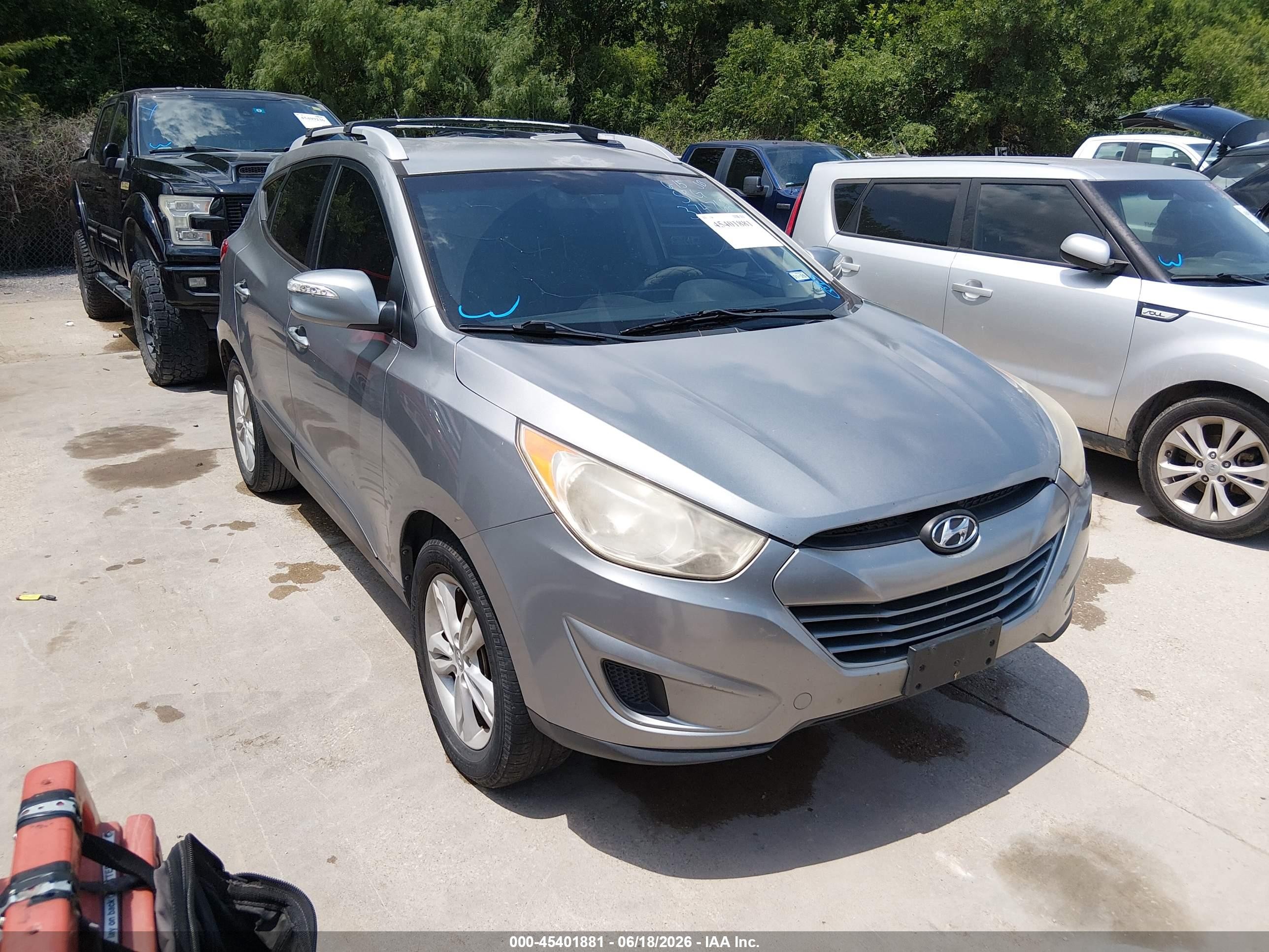 2012 Hyundai Tucson Limited, VIN KM8JU3AC5CU374762 — Repossession