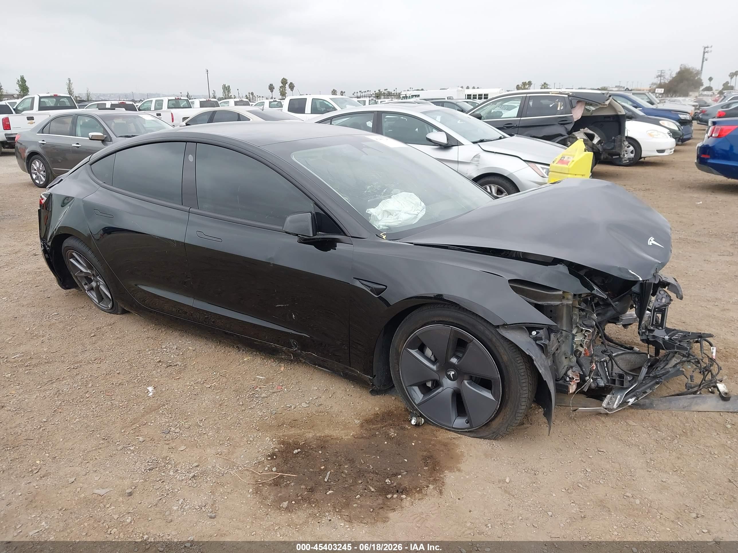 2021 Tesla Model 3 Standard Range Plus, VIN 5YJ3E1EA2MF930267 — Front end