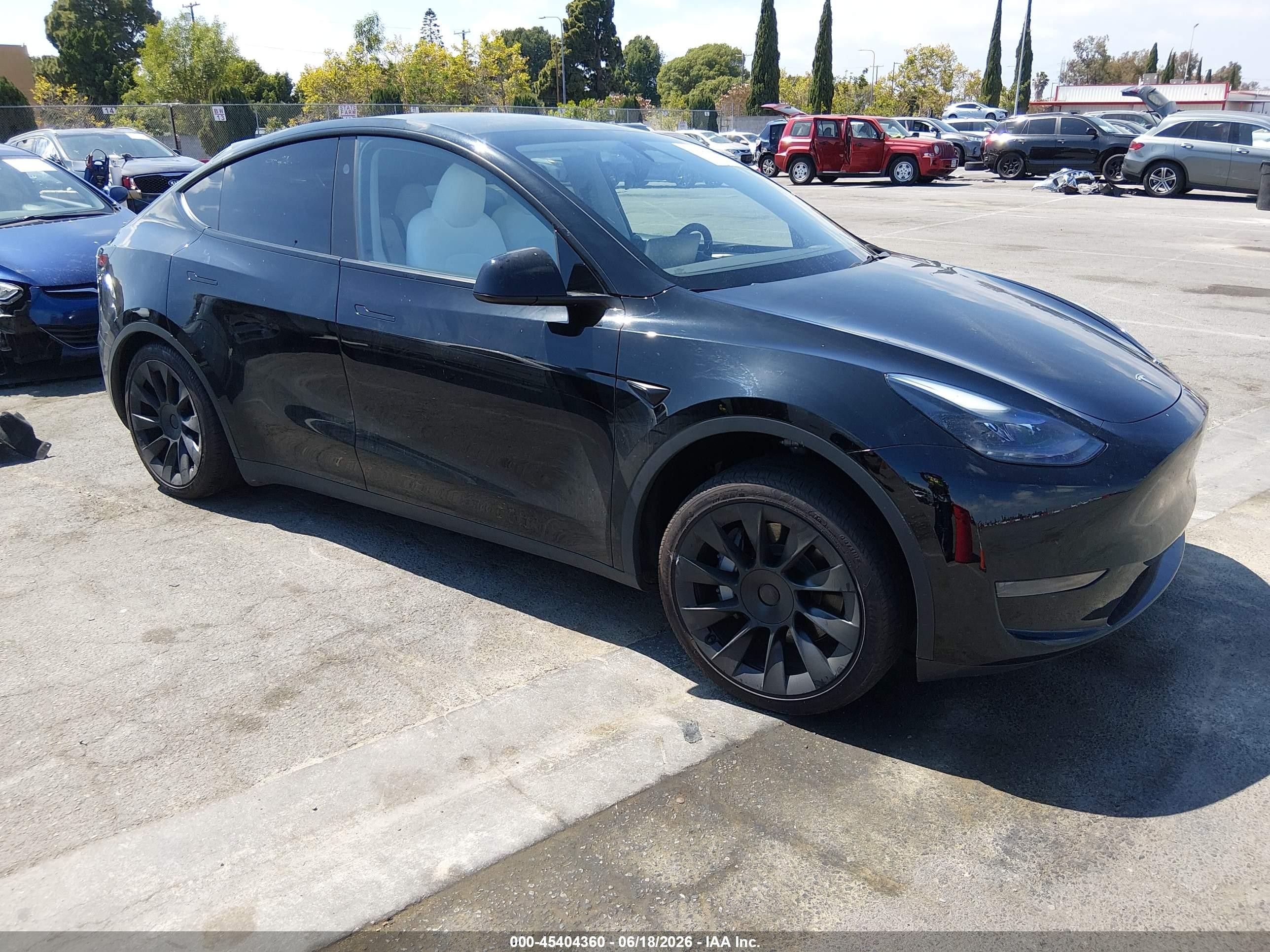 2024 Tesla Model Y, VIN 7SAYGDED3RF025168 — Rear end