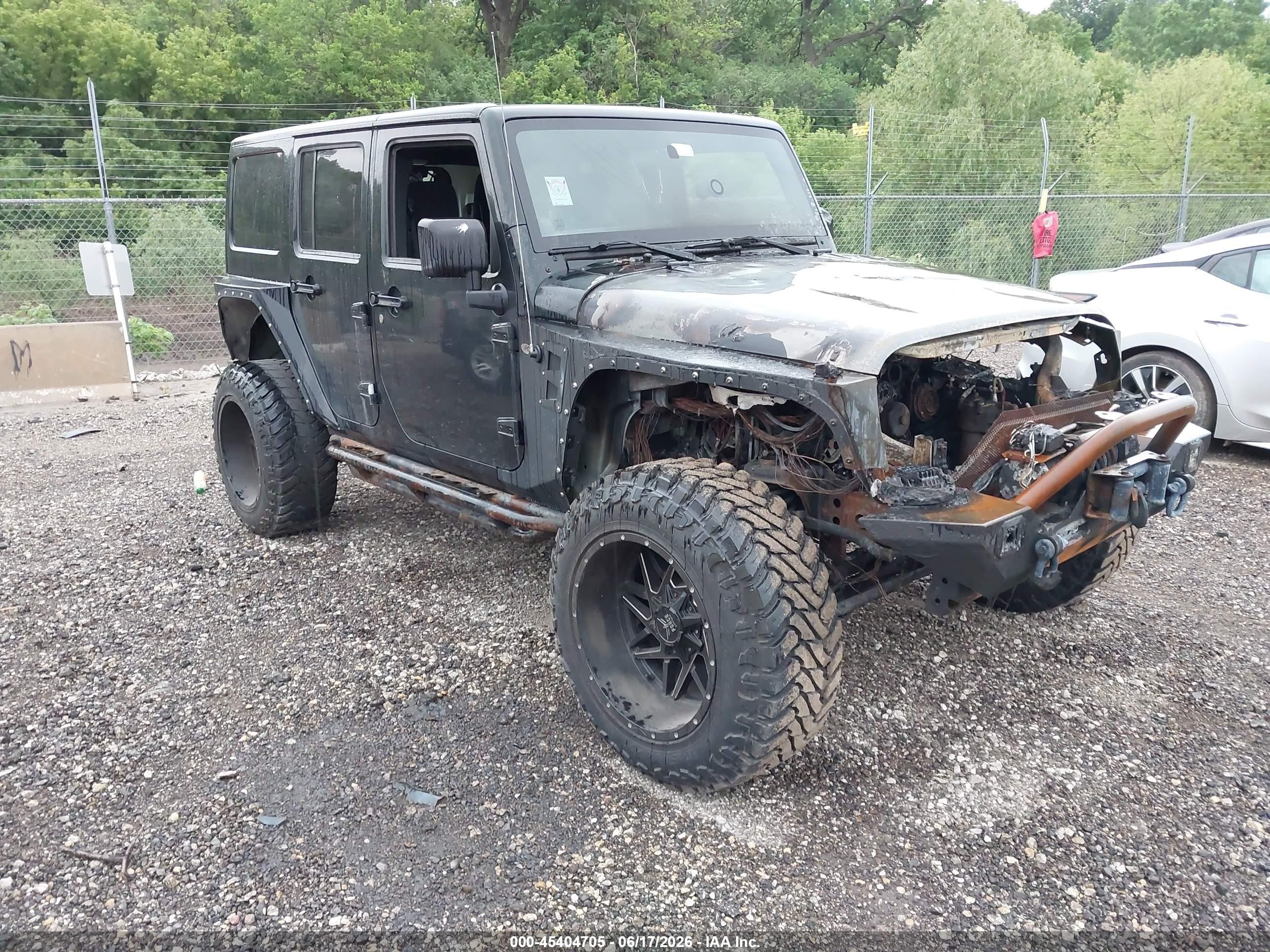 2012 Jeep Wrangler Unlimited Sahara, VIN 1C4BJWEGXCL229495 — Engine fire