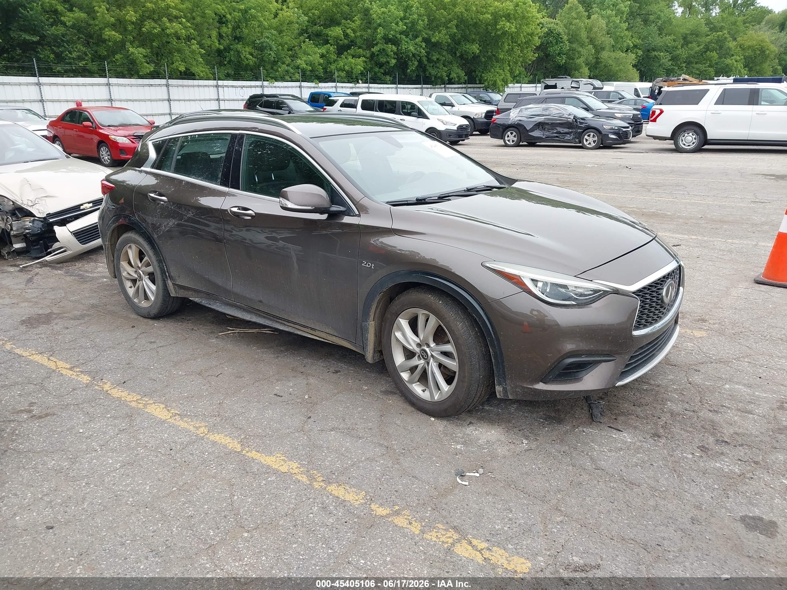 2019 Infiniti QX30 Luxe, VIN SJKCH5CP7KA011728 — Side