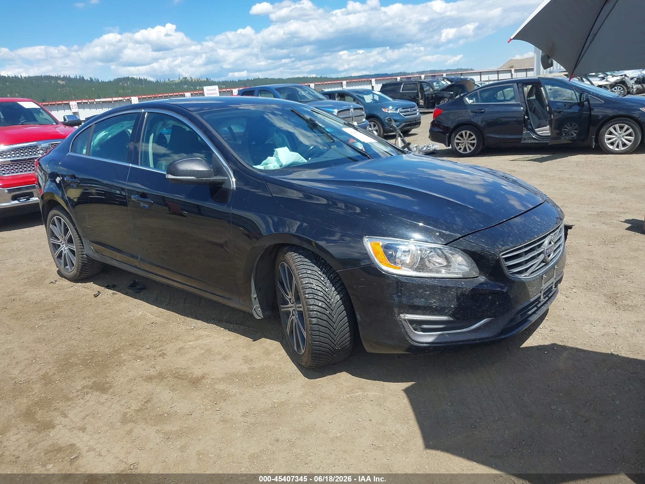 2016 Volvo S60 T5 Drive-E Premier, VIN LYV402FK3GB092952 — Side