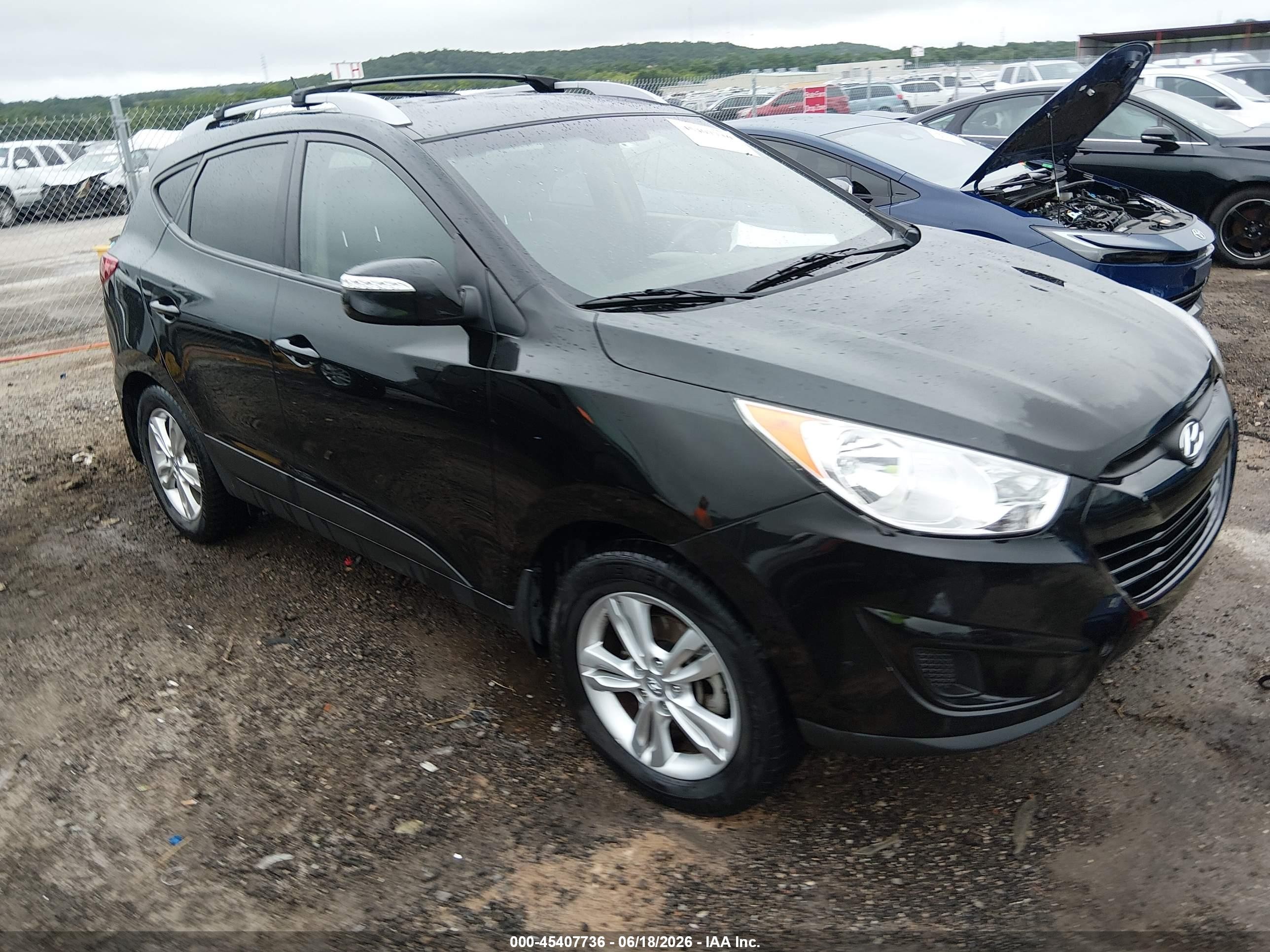 2012 Hyundai Tucson GLS, VIN KM8JU3AC3CU377580 — Side