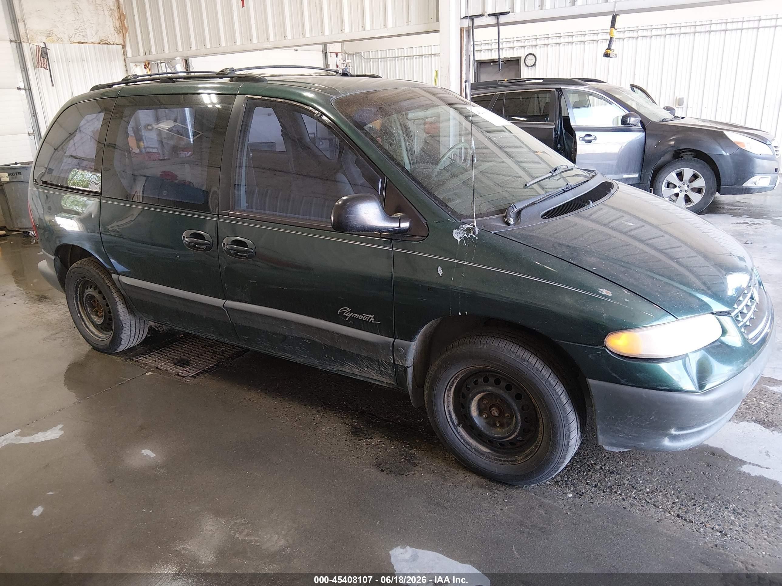 1999 Plymouth Voyager, VIN 2P4GP45GXXR192689 — Normal wear