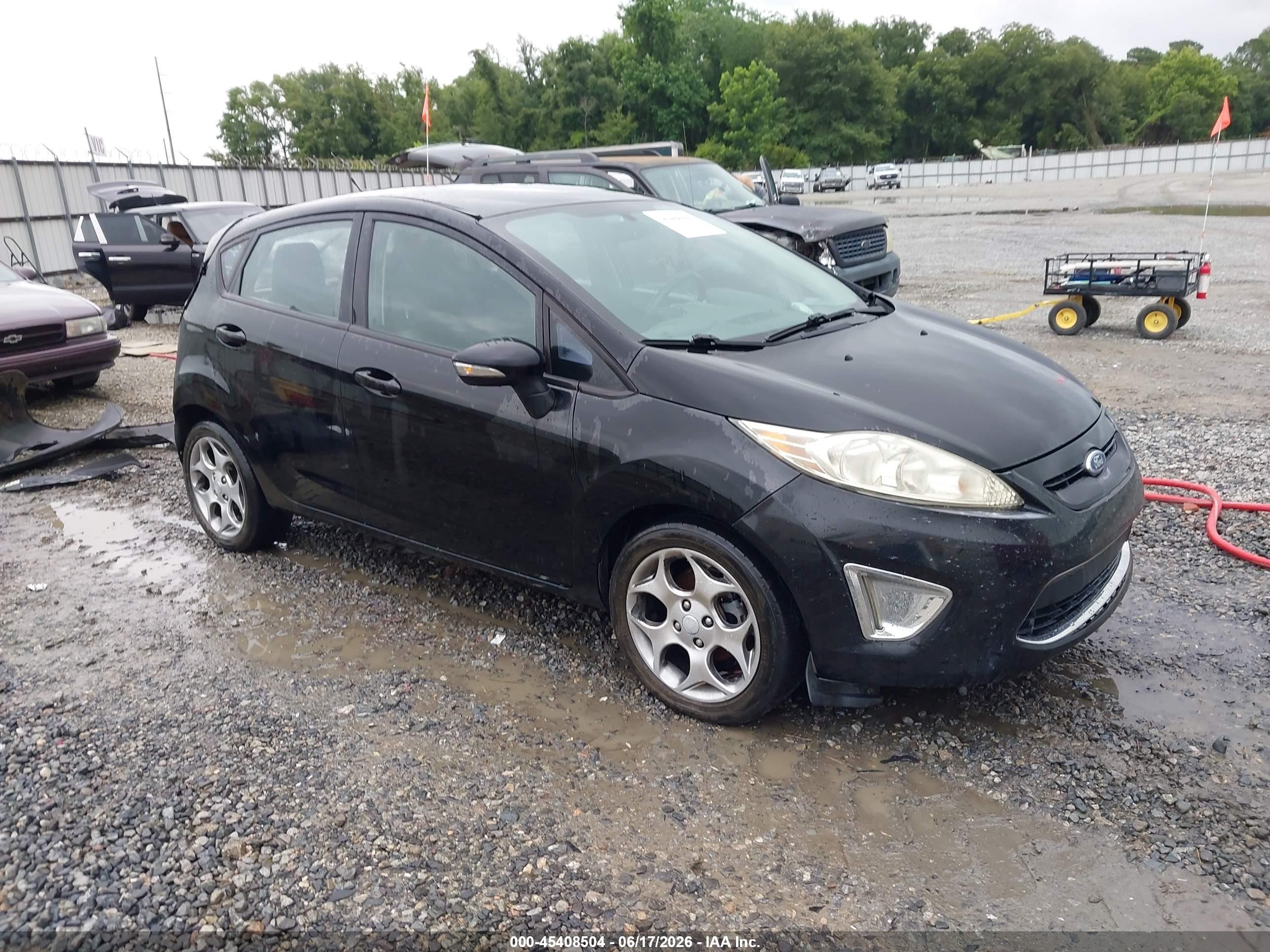 2012 Ford Fiesta SES, VIN 3FADP4FJ2CM137209 — Rear end