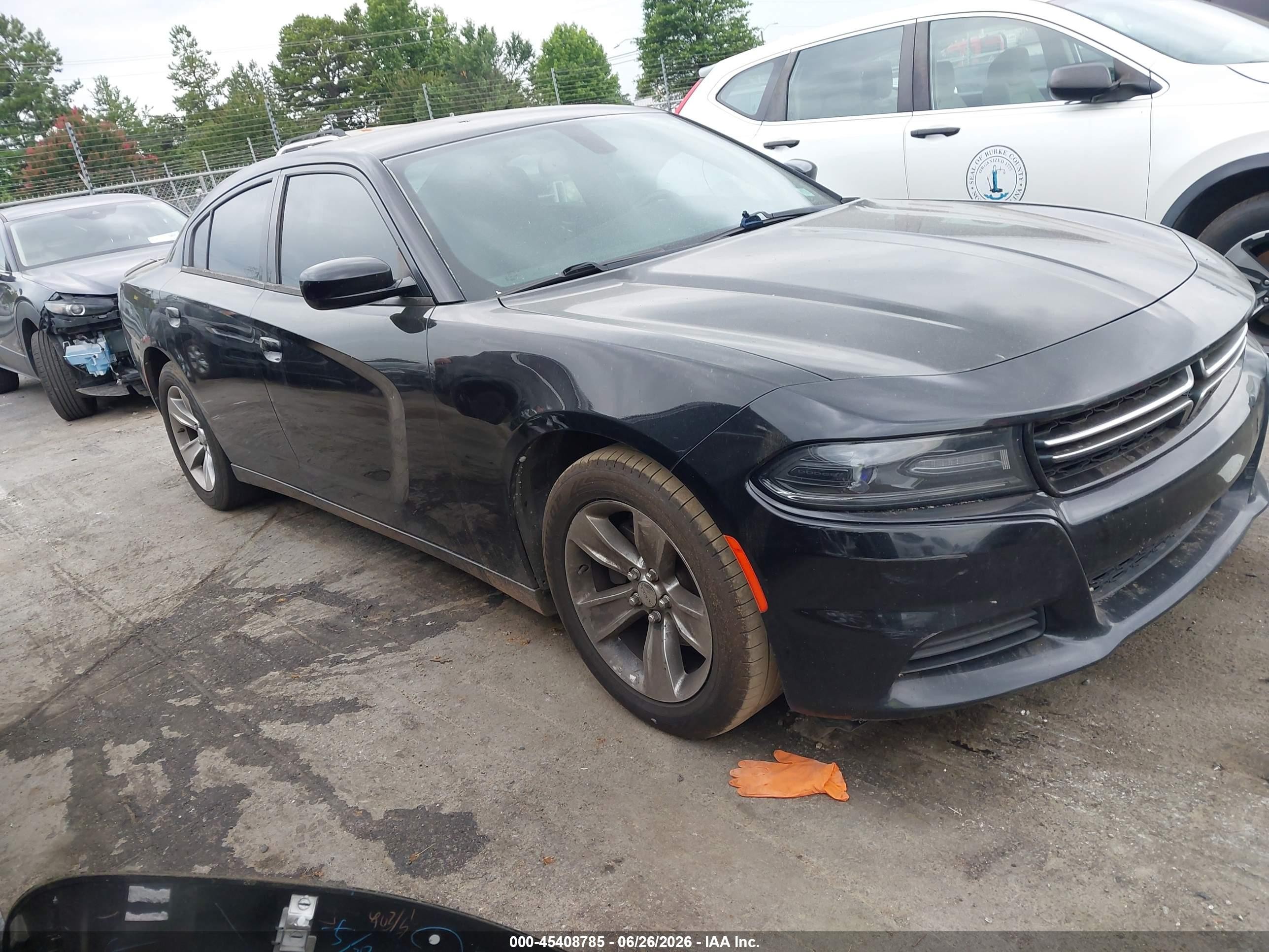2015 Dodge Charger SE, VIN 2C3CDXBG2FH735303 — Normal wear