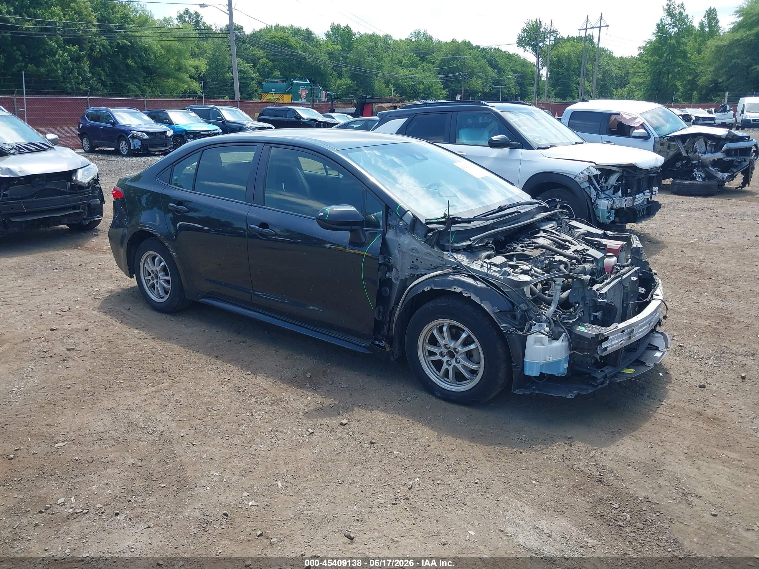 2021 Toyota Corolla Hybrid LE, VIN JTDEAMDE2MJ032108 — Front end