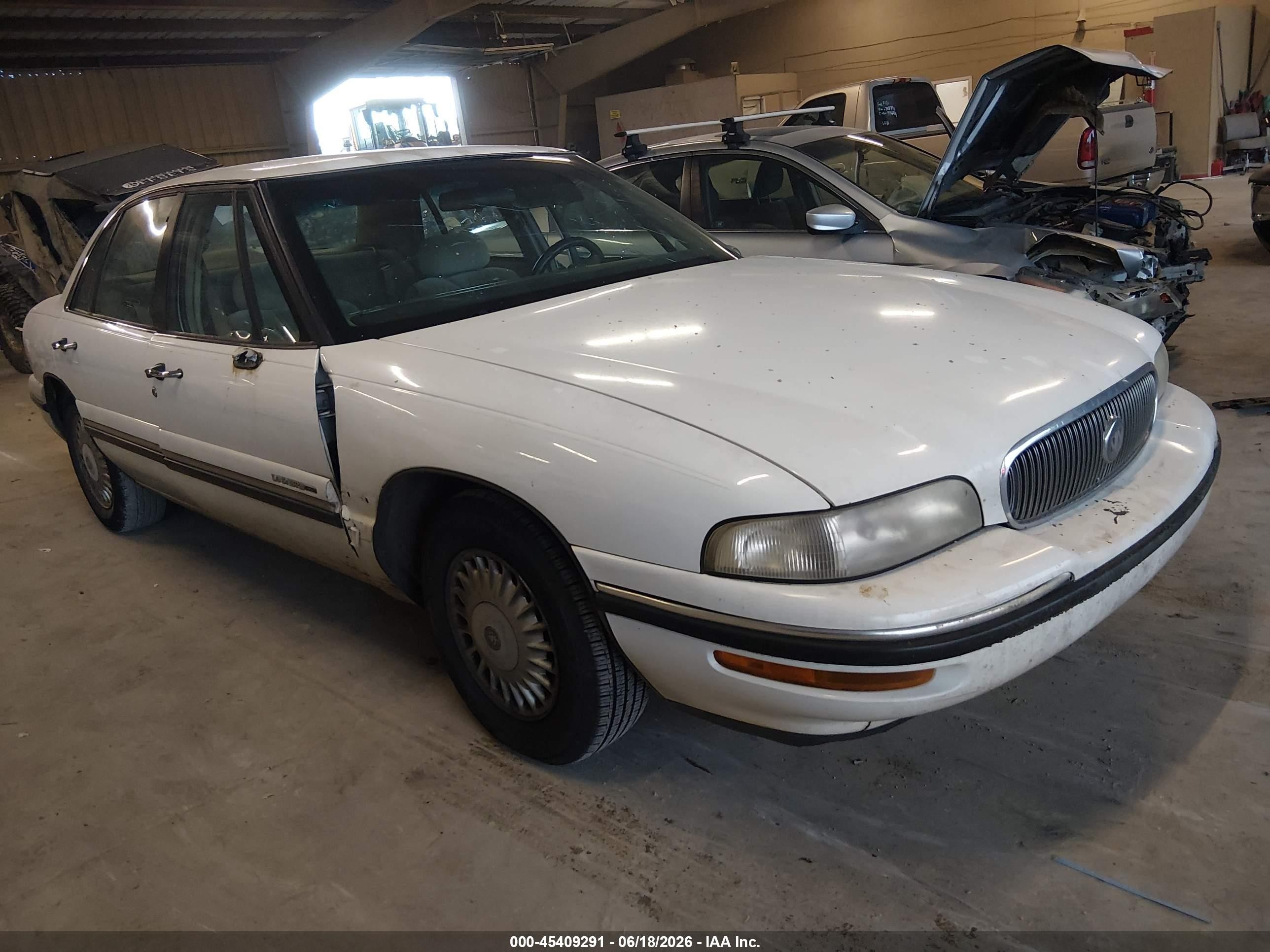 1999 Buick LeSabre Custom, VIN 1G4HP52K2XH450735 — Side