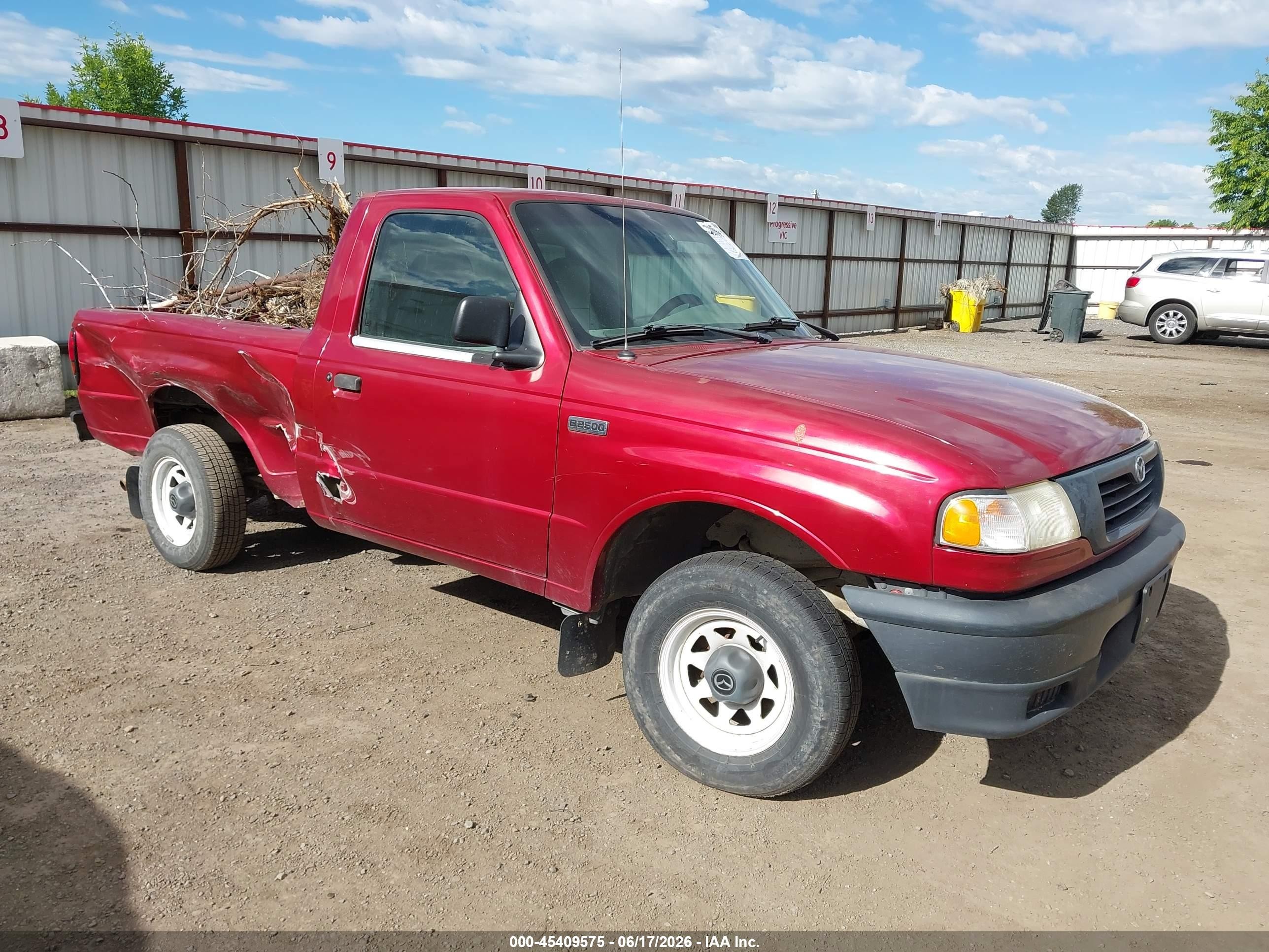 1999 Mazda B-Series SX, VIN 4F4YR12C8XTM48170 — Side