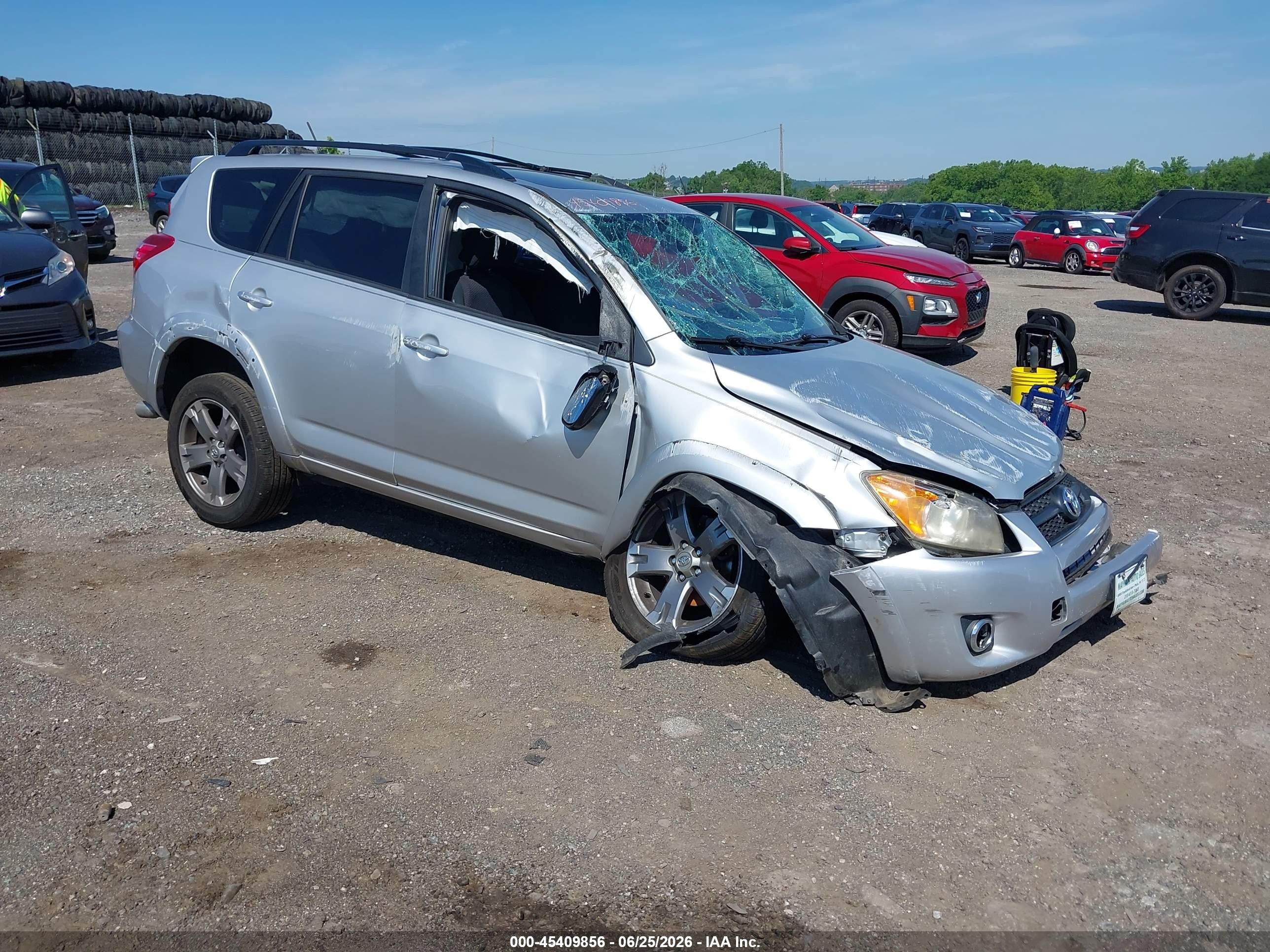 2010 Toyota RAV4 Sport, VIN JTMRK4DV9A5096102 — Side