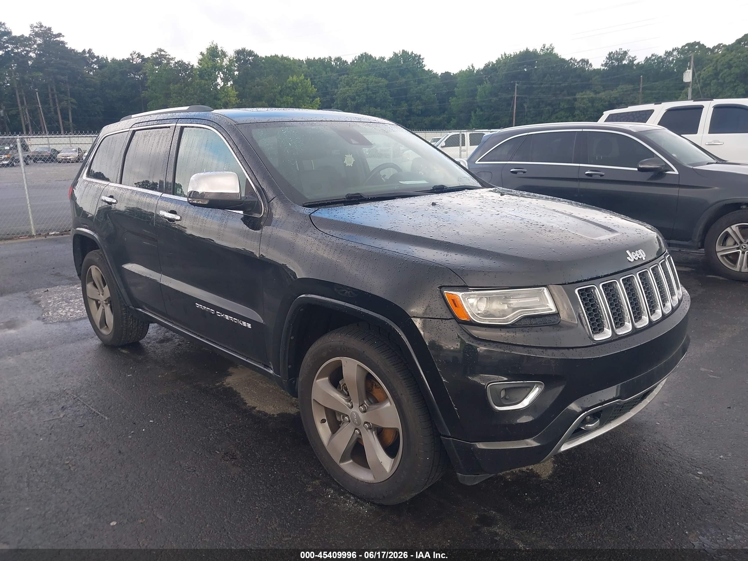 2014 Jeep Grand Cherokee Overland, VIN 1C4RJECGXEC433650 — Normal wear