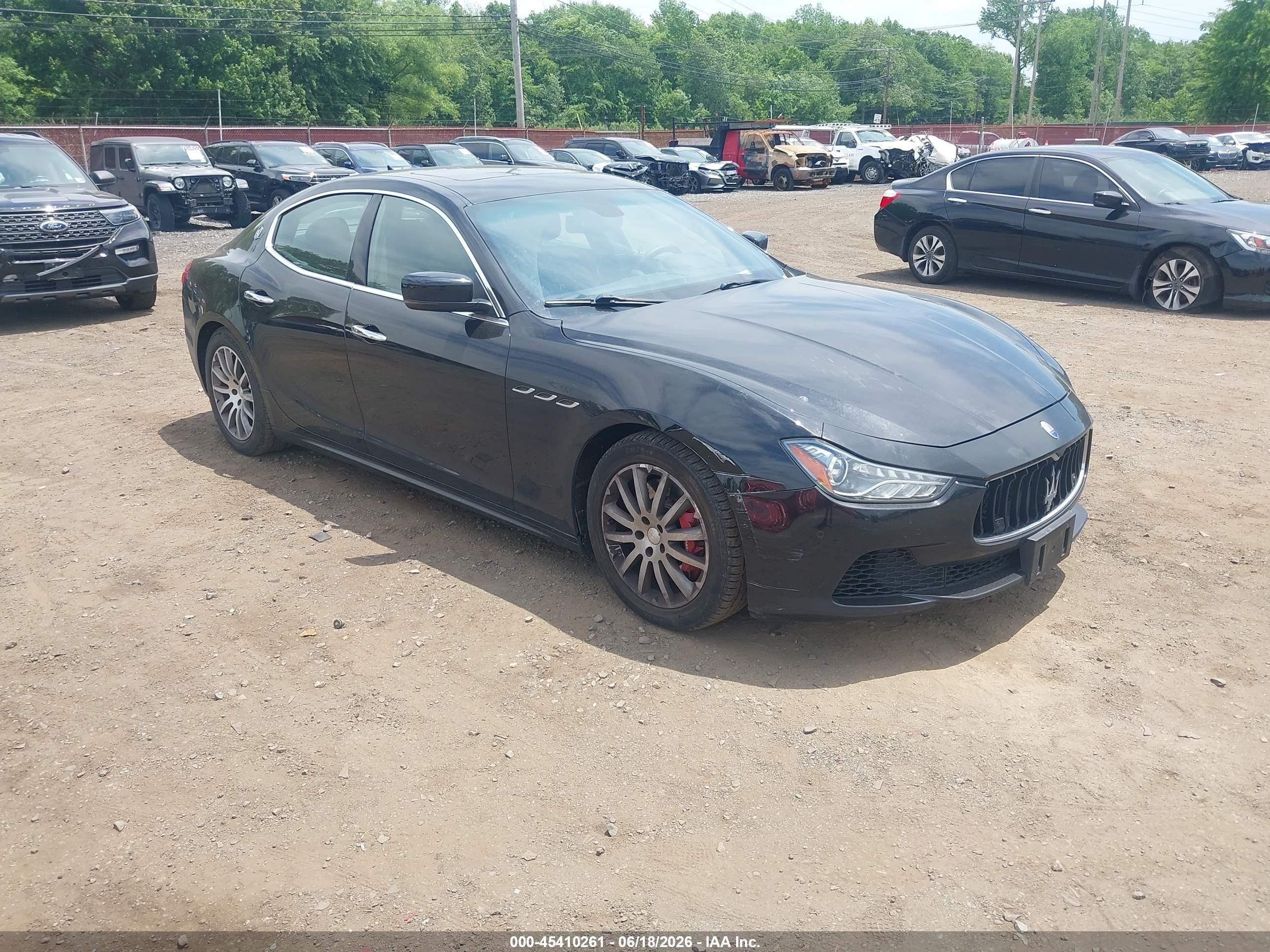 2015 Maserati Ghibli S Q4, VIN ZAM57RTA2F1149664 — Side