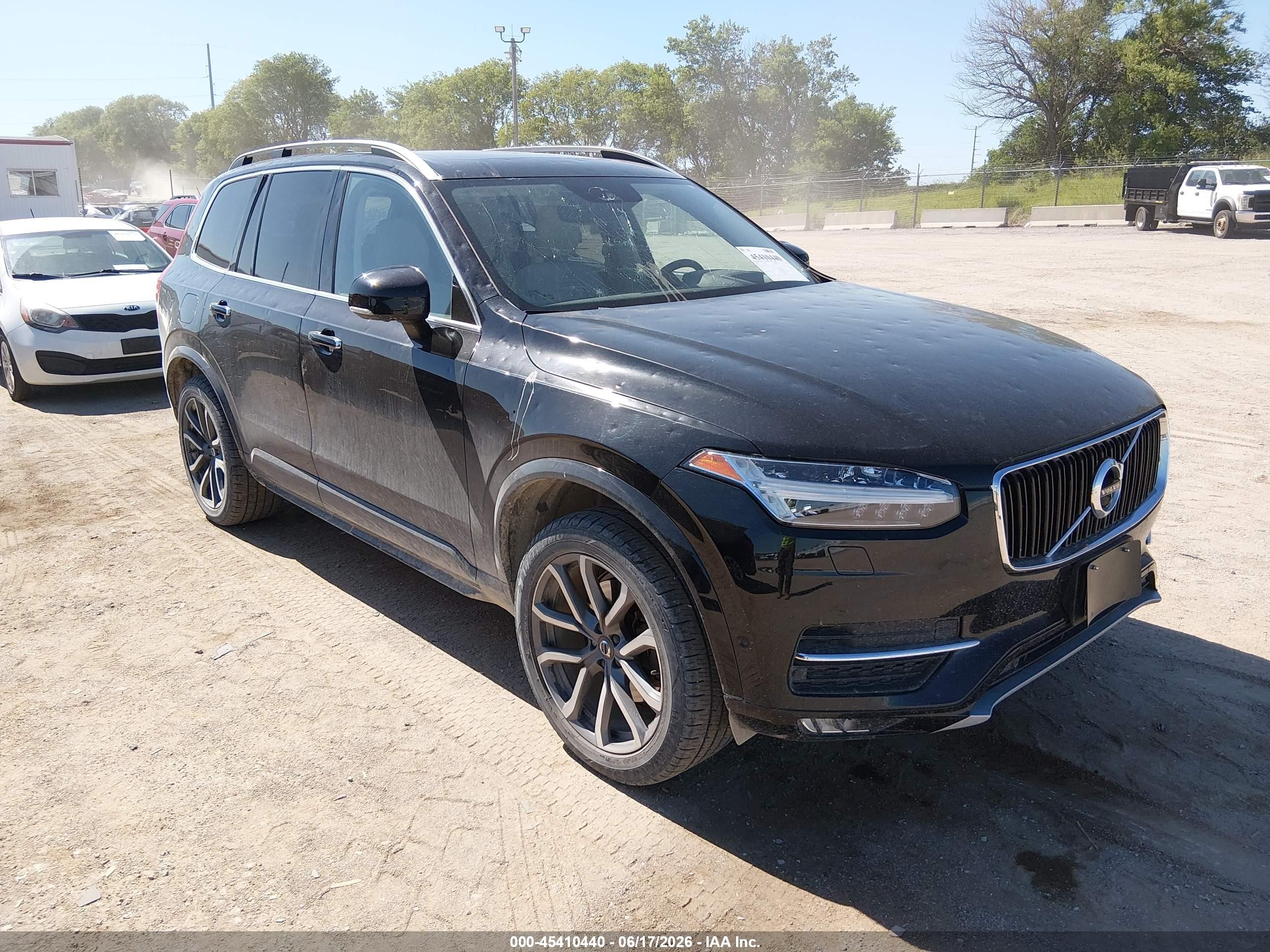 2016 Volvo XC90 T6 Momentum, VIN YV4A22PK3G1071230 — Hail