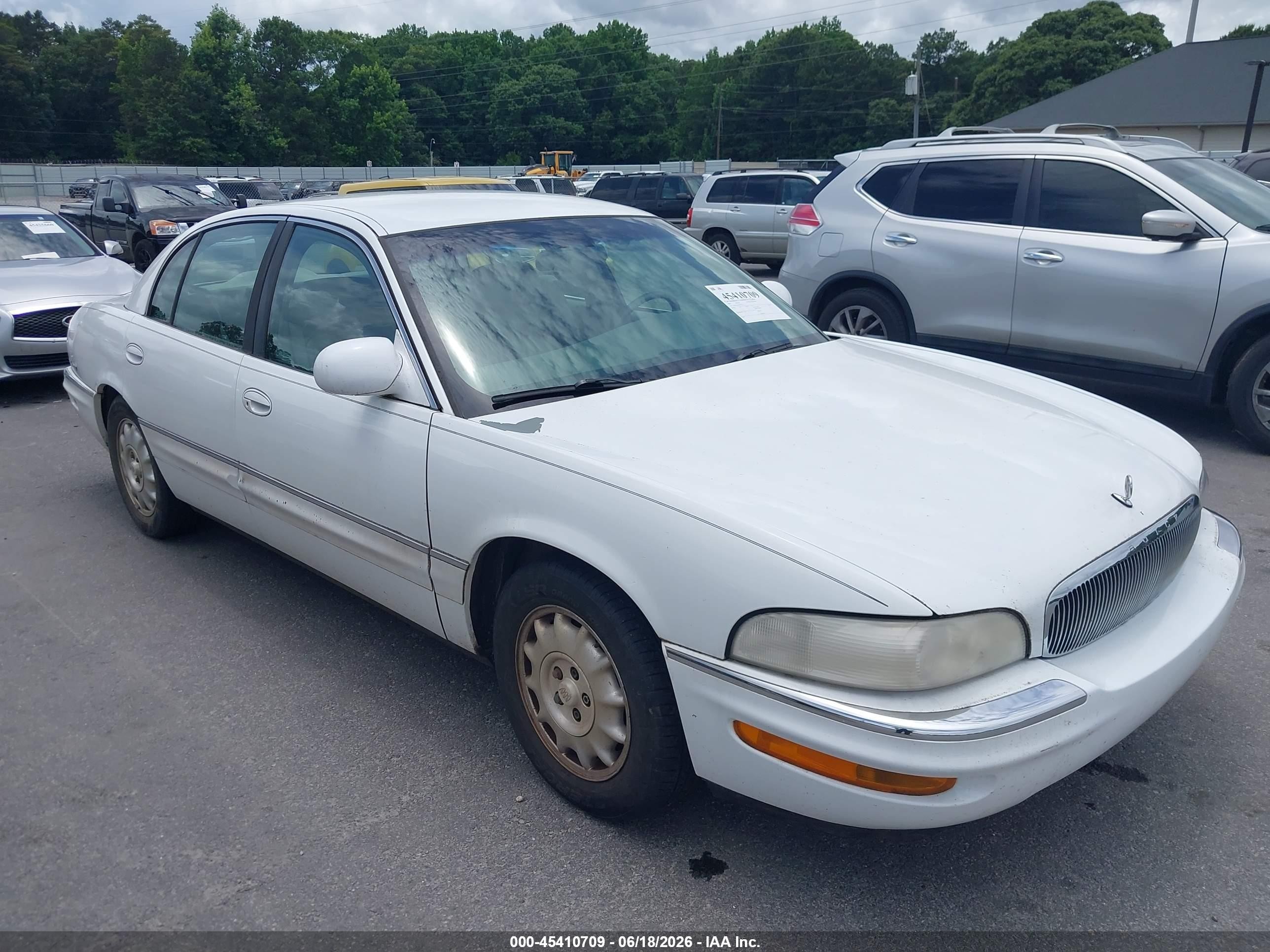 1999 Buick Park Avenue, VIN 1G4CW52K4X4657311 — Normal wear