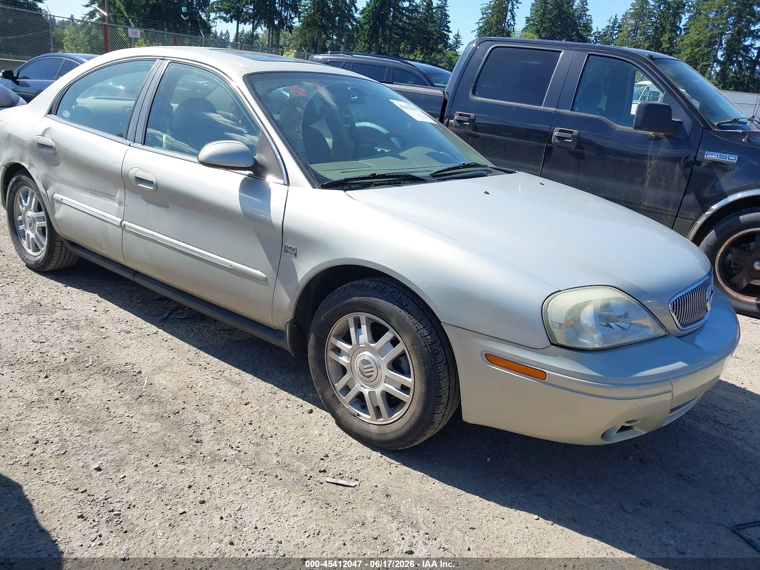 2005 Mercury Sable LS, VIN 1MEFM55S65A602438 — Side