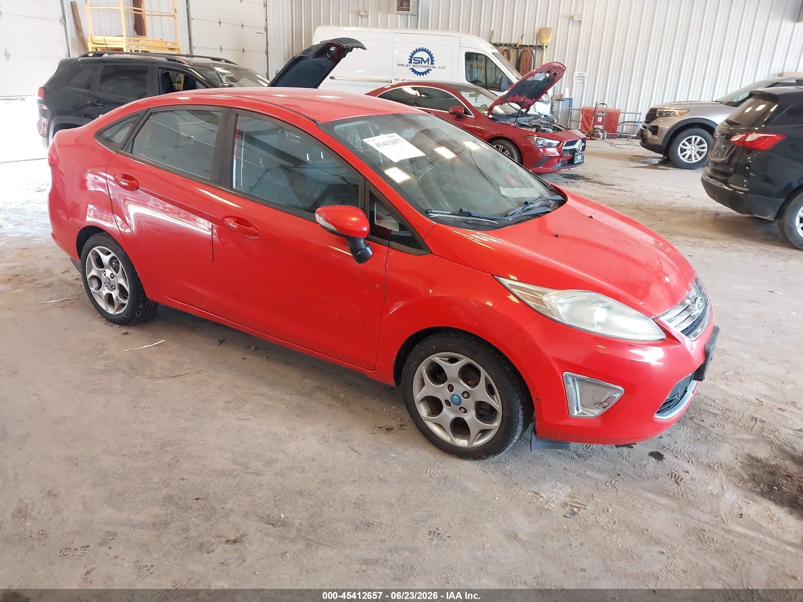 2012 Ford Fiesta SEL, VIN 3FADP4CJ7CM195028 — Normal wear