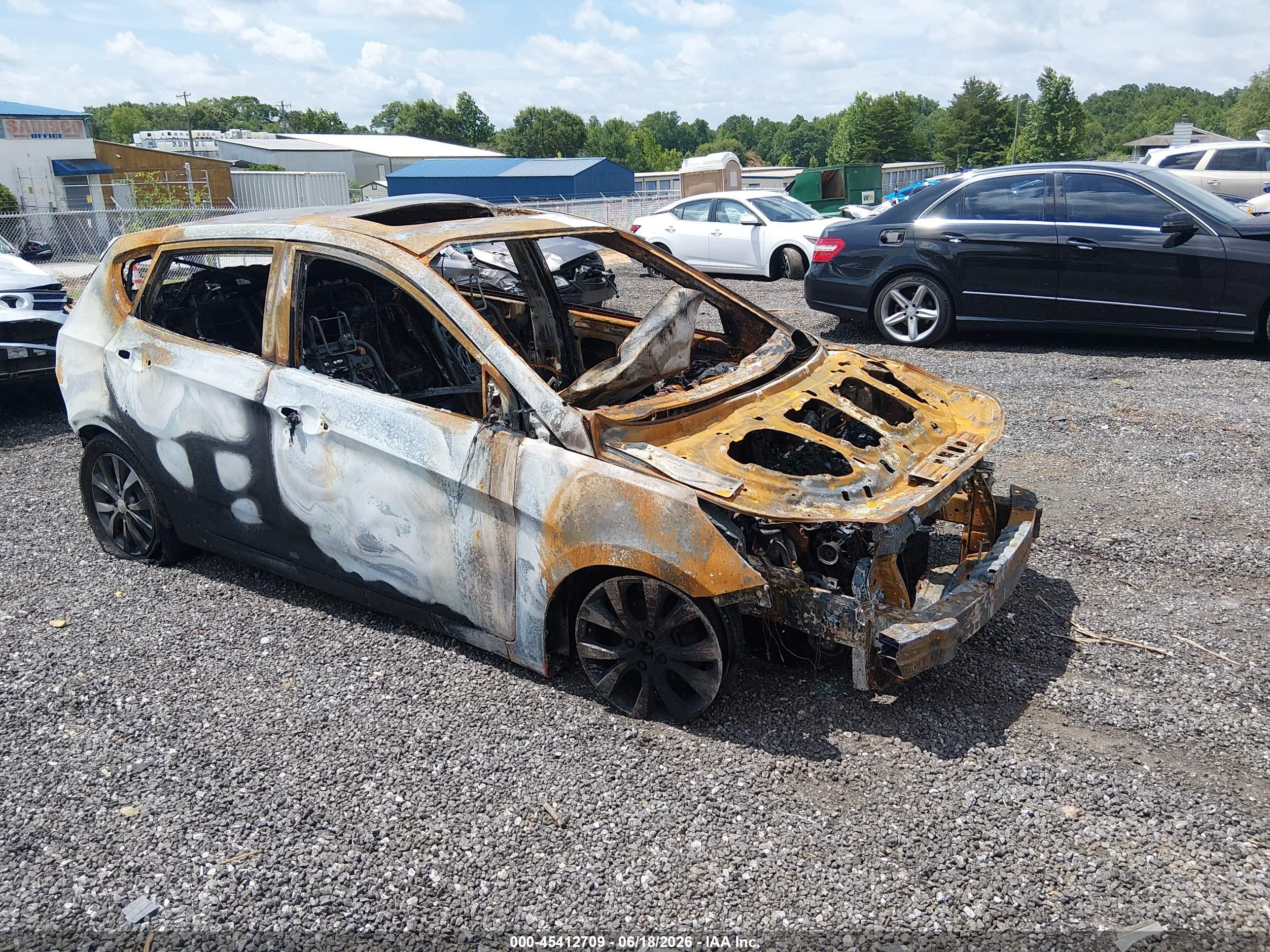 2015 Hyundai Accent Sport, VIN KMHCU5AE9FU230755 — Burn