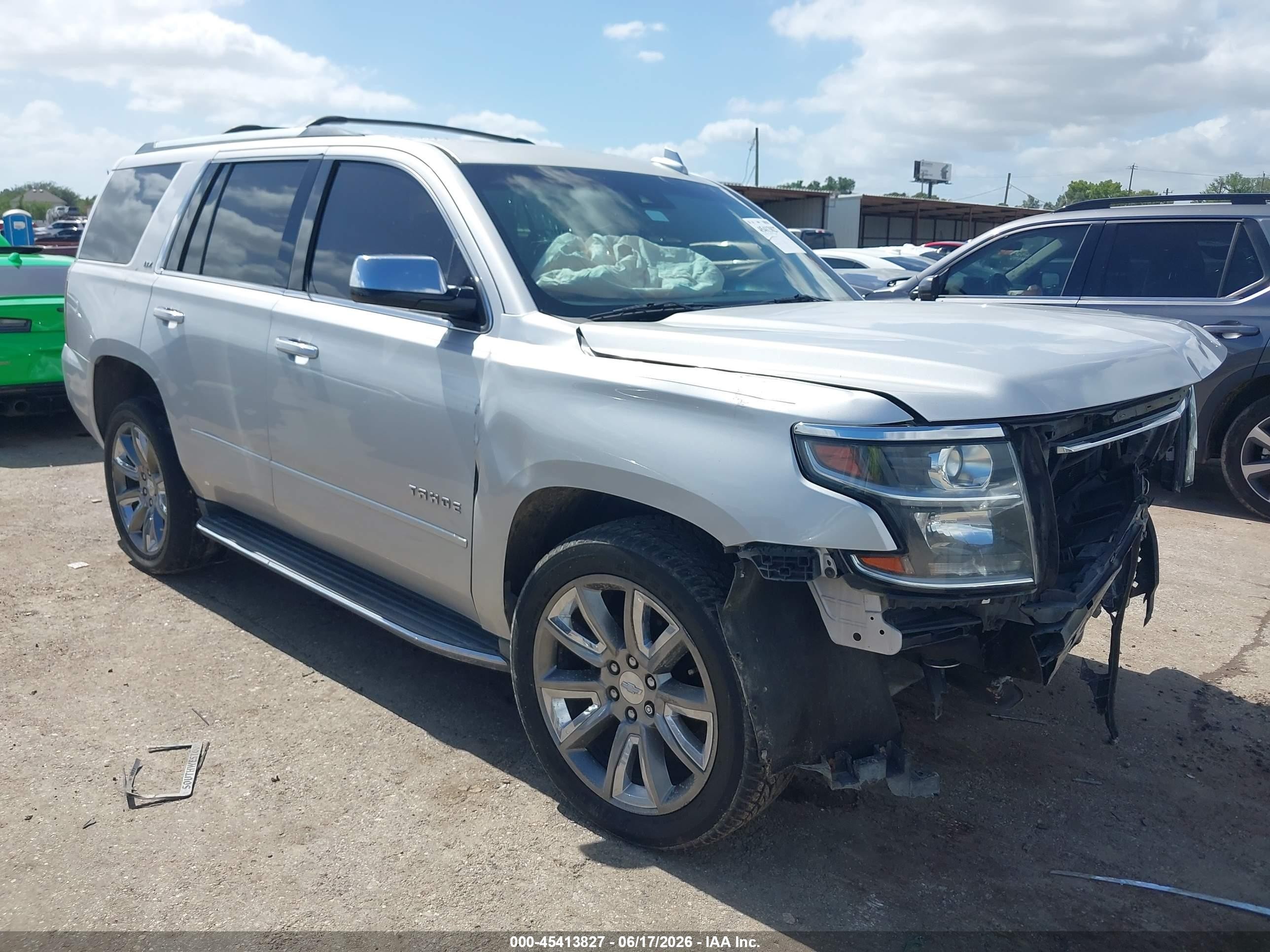 2015 Chevrolet Tahoe LTZ, VIN 1GNSCCKC3FR714872 — Front end