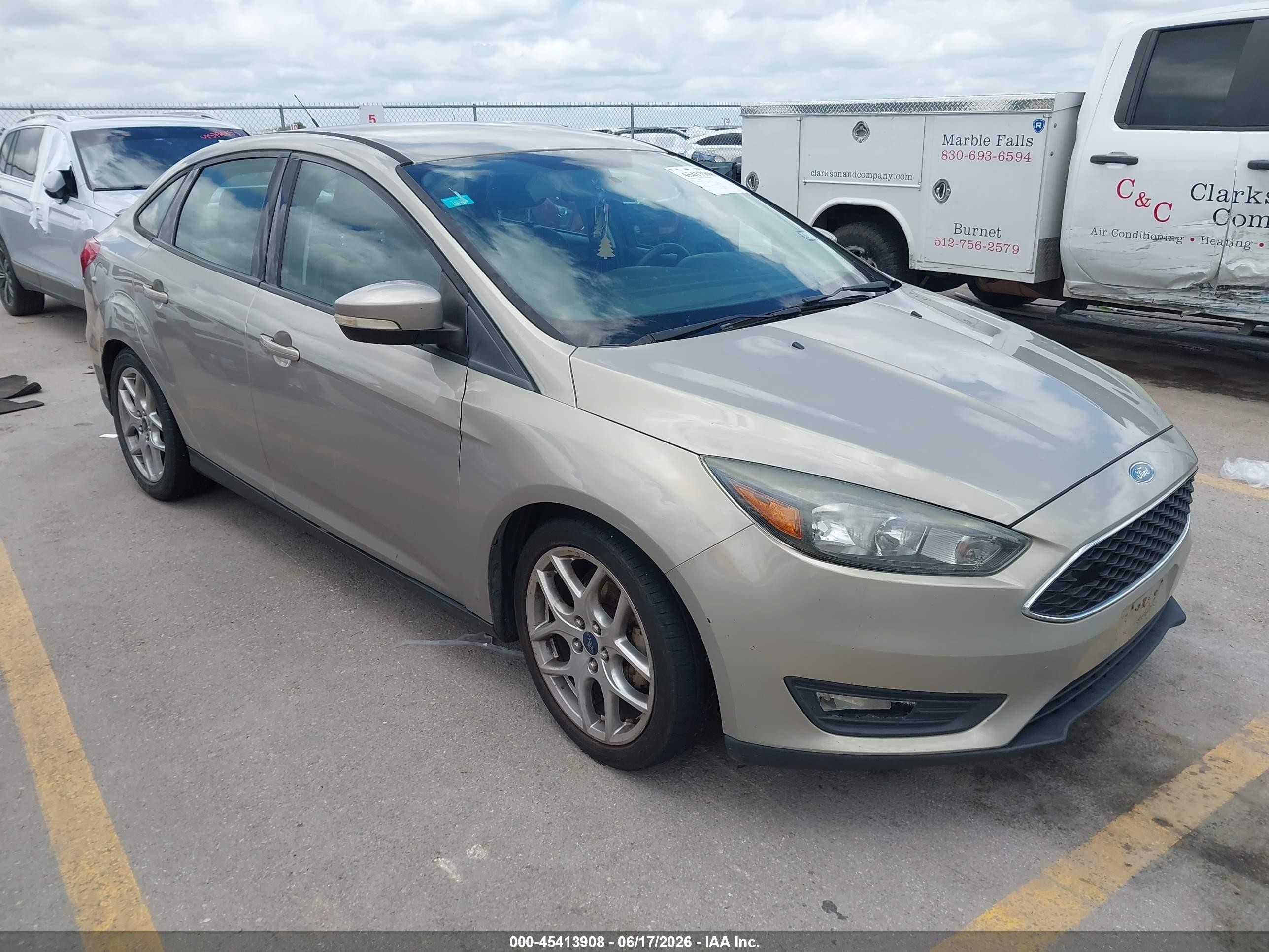2015 Ford Focus SE, VIN 1FADP3F26FL296453 — Water / flood