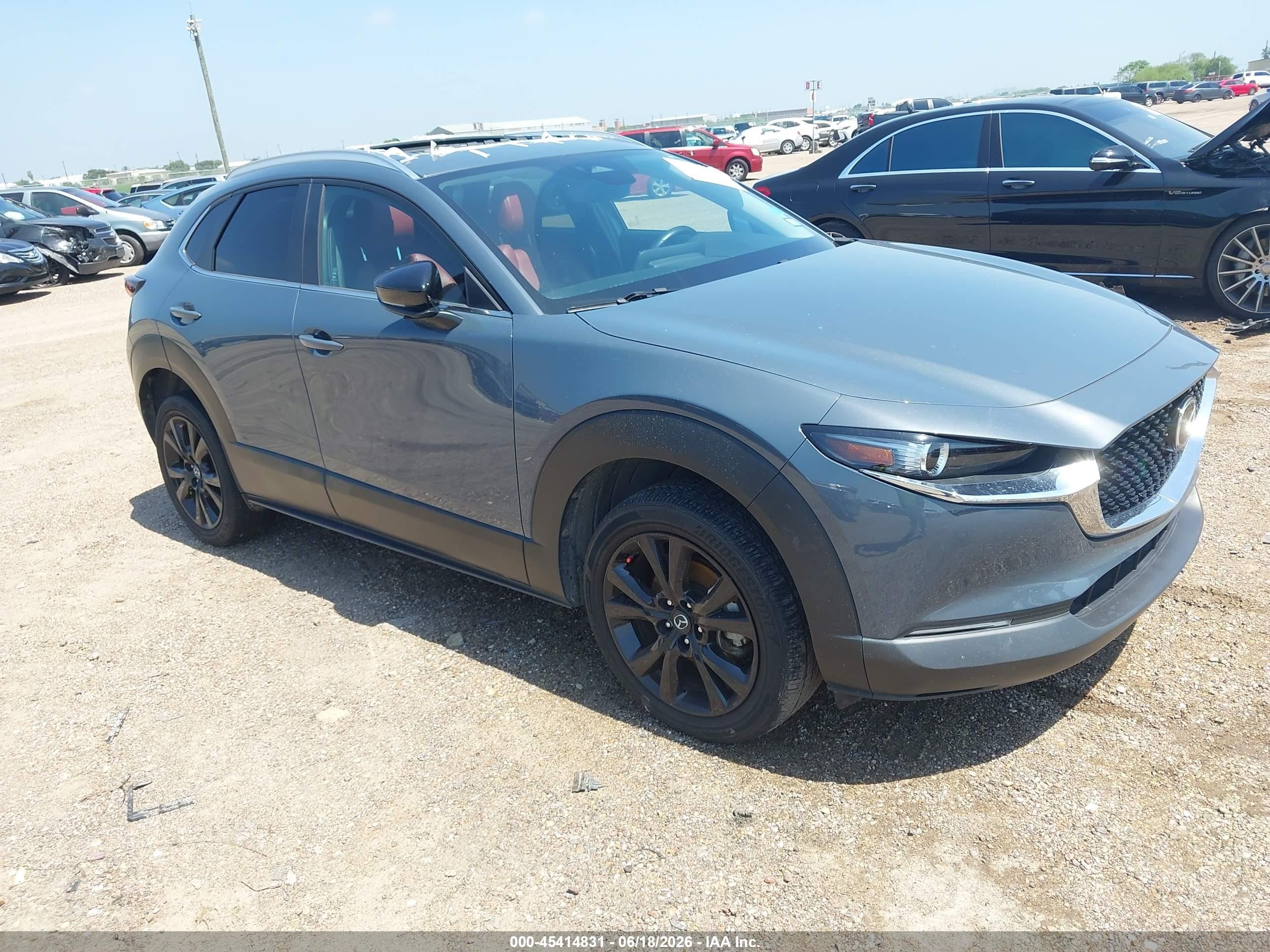 2024 Mazda CX-30 S Carbon Edition, VIN 3MVDMBCM5RM649169 — Water / flood