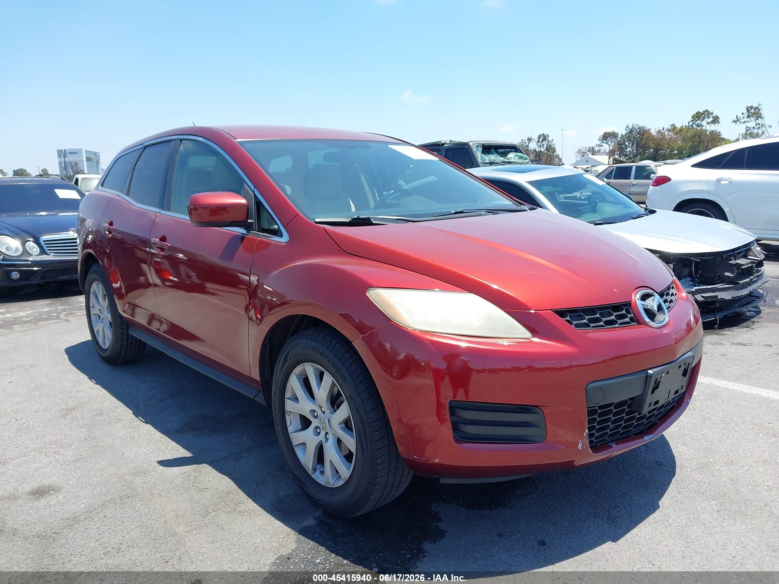 2009 Mazda CX-7 Touring, VIN JM3ER29L590218010 — Side