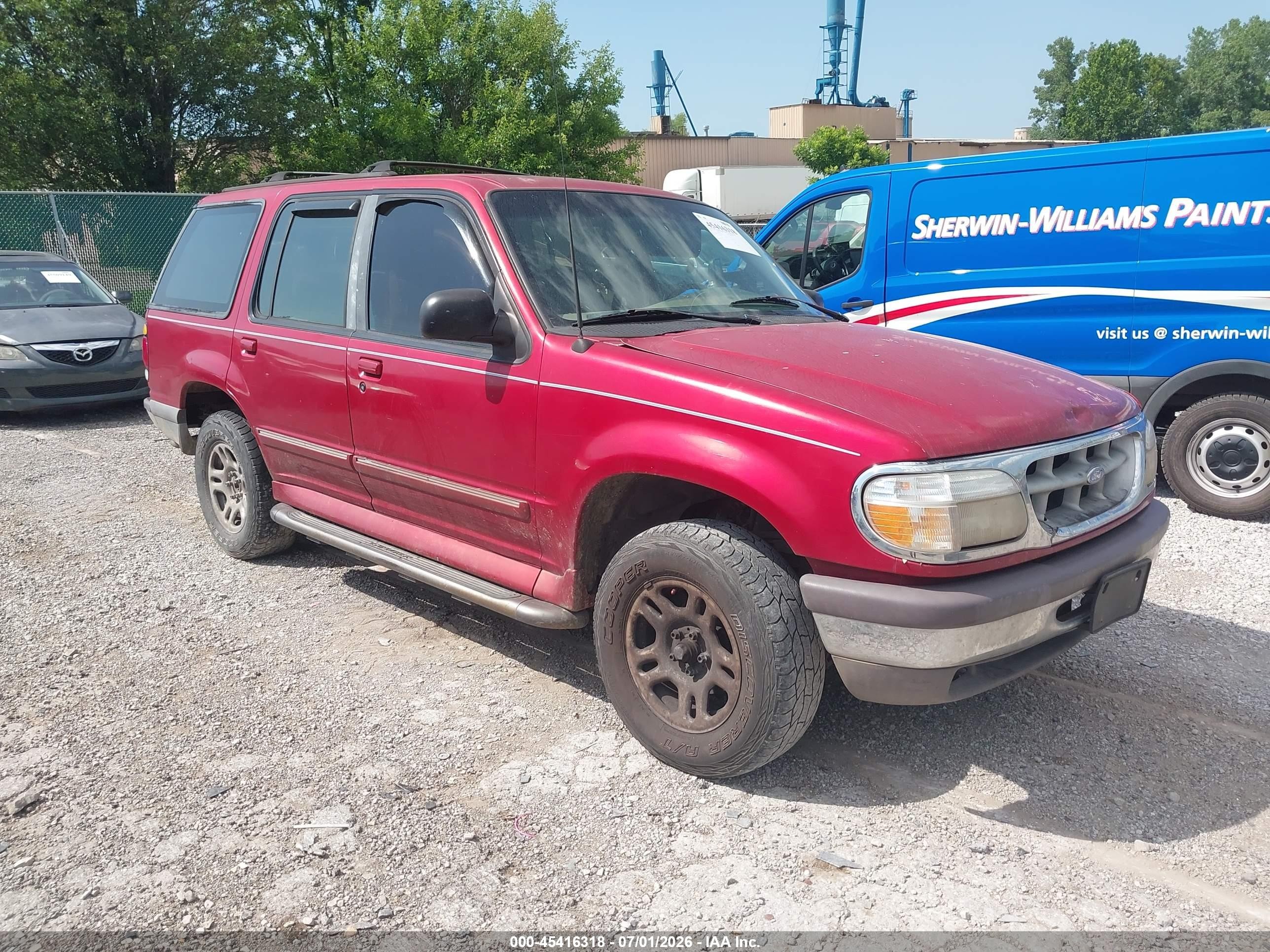1997 Ford Explorer XL, VIN 1FMDU32E5VUB18752 — Side