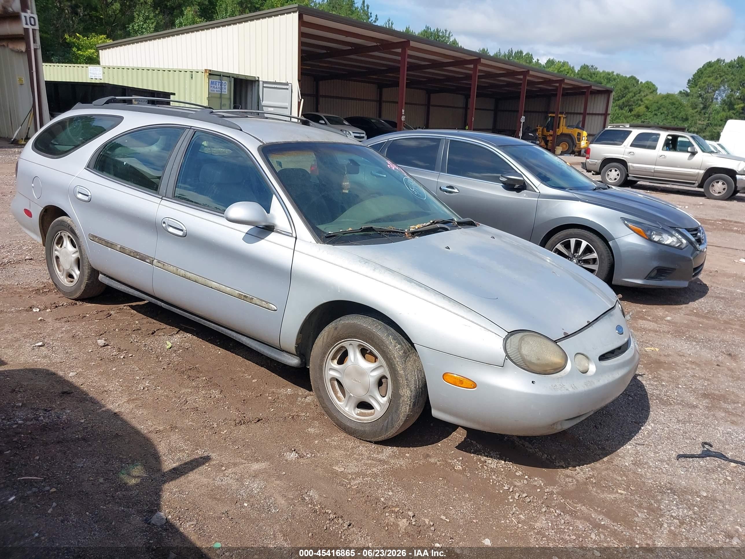 1997 Ford Taurus GL, VIN 1FALP57U4VG295638 — Normal wear