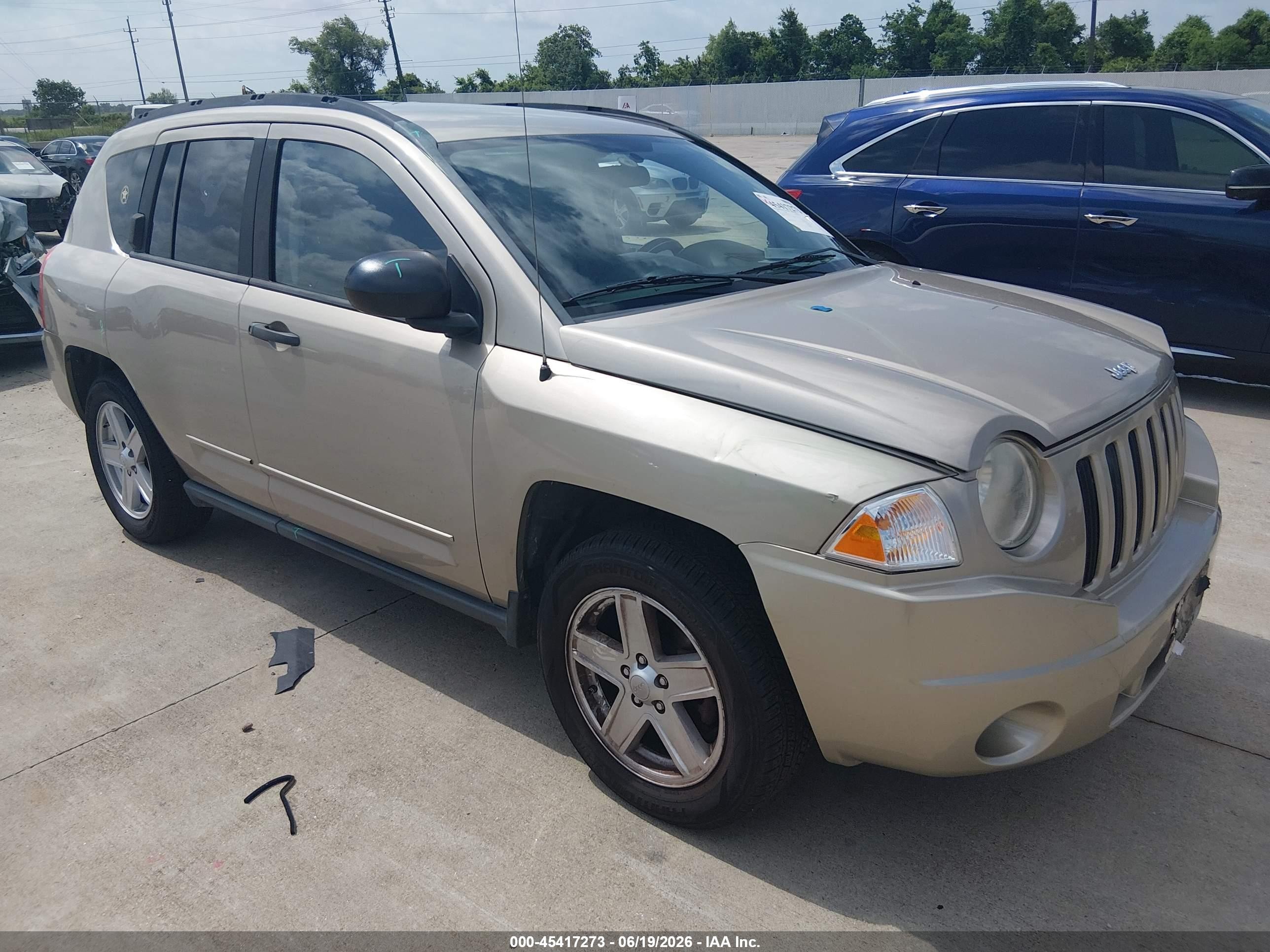 2010 Jeep Compass Sport, VIN 1J4NT1FA9AD629716 — Front end