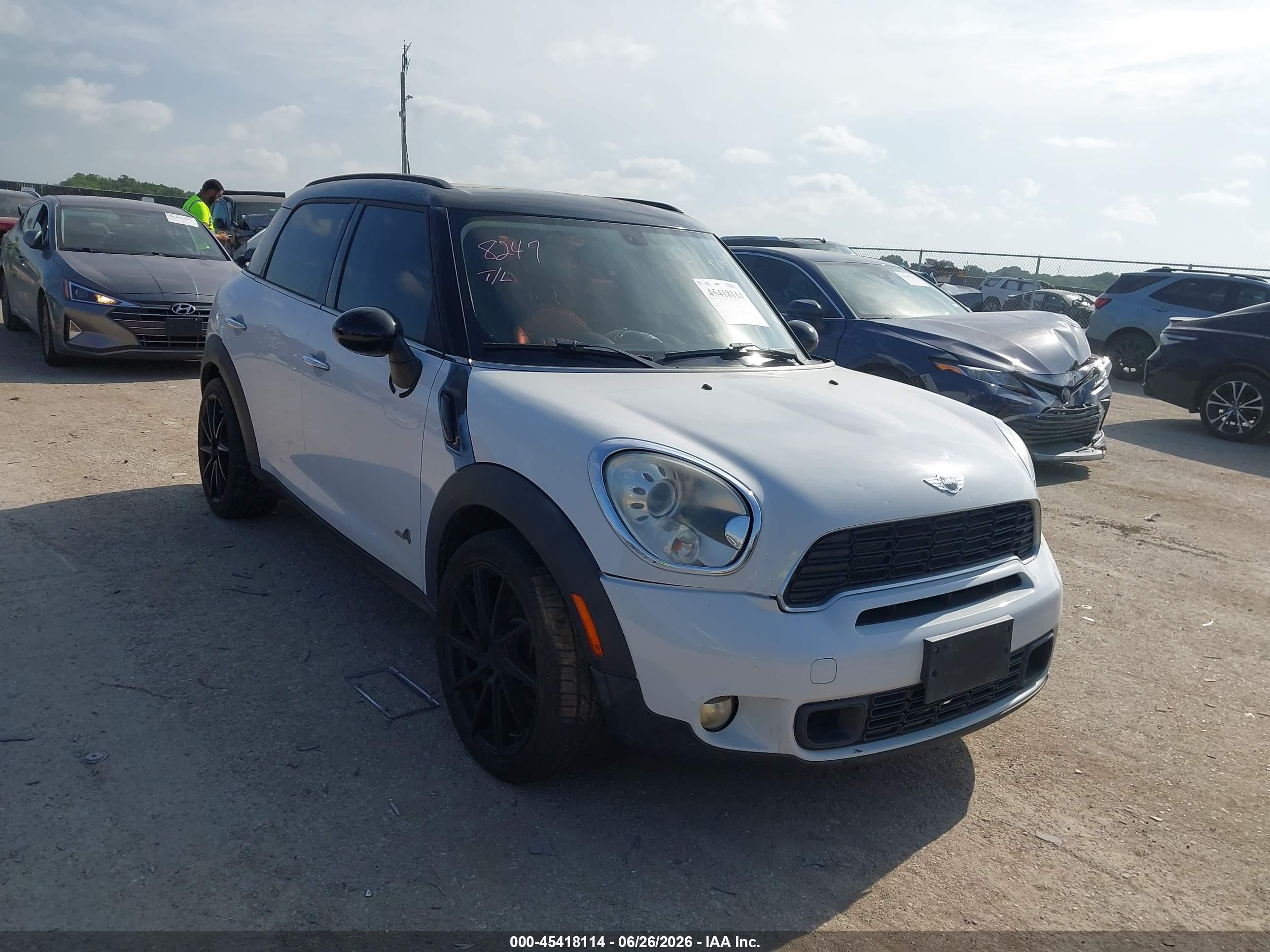 2011 MINI Countryman S, VIN WMWZC5C5XBWH99255 — Side