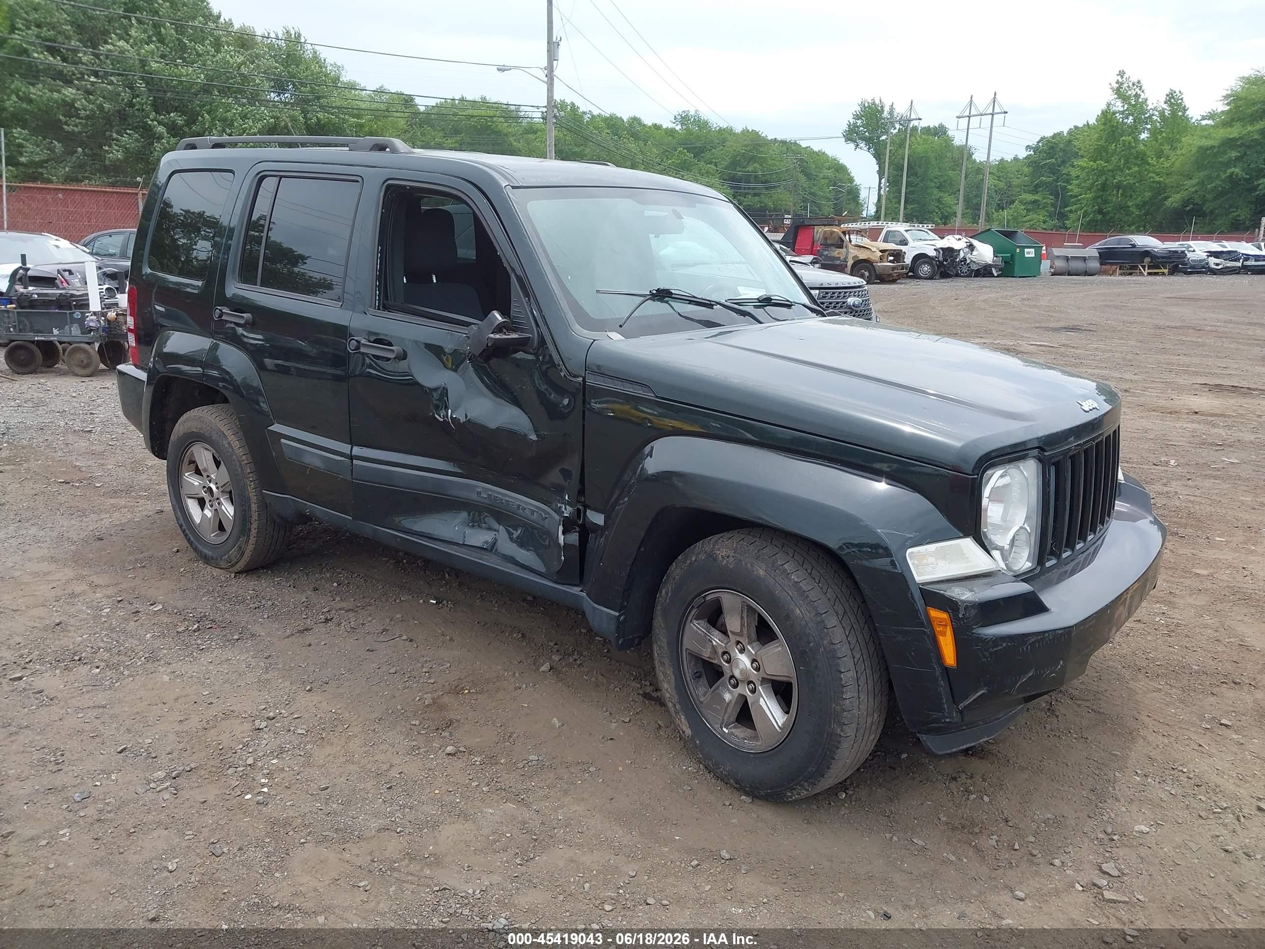 2012 Jeep Liberty Sport, VIN 1C4PJMAKXCW146300 — Бок