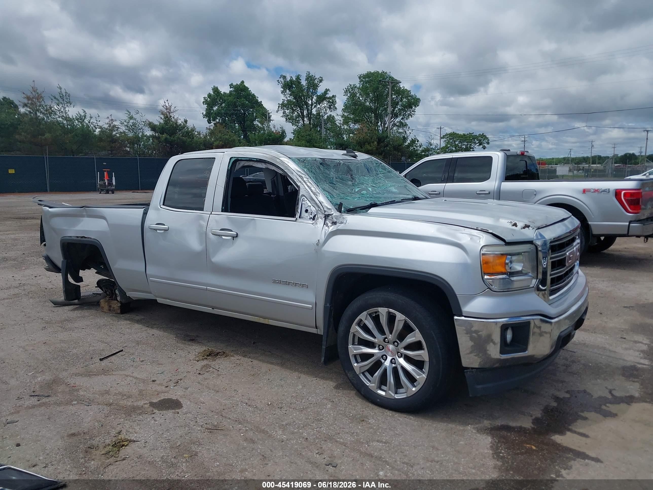 2015 GMC Sierra 1500 SLE, VIN 1GTV2UEC9FZ220669 — Rollover