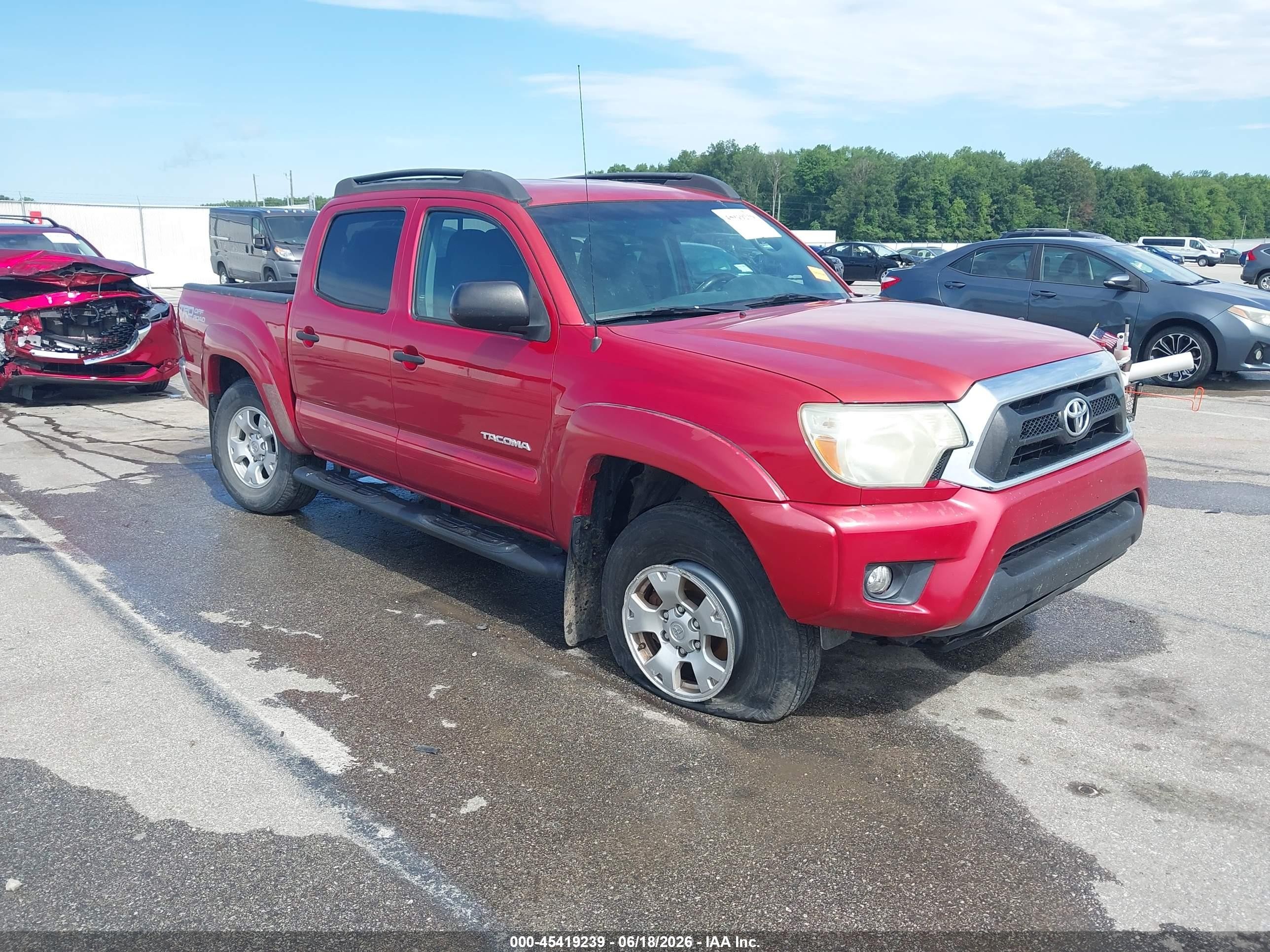 2015 Toyota Tacoma, VIN 3TMLU4EN7FM185070 — Side