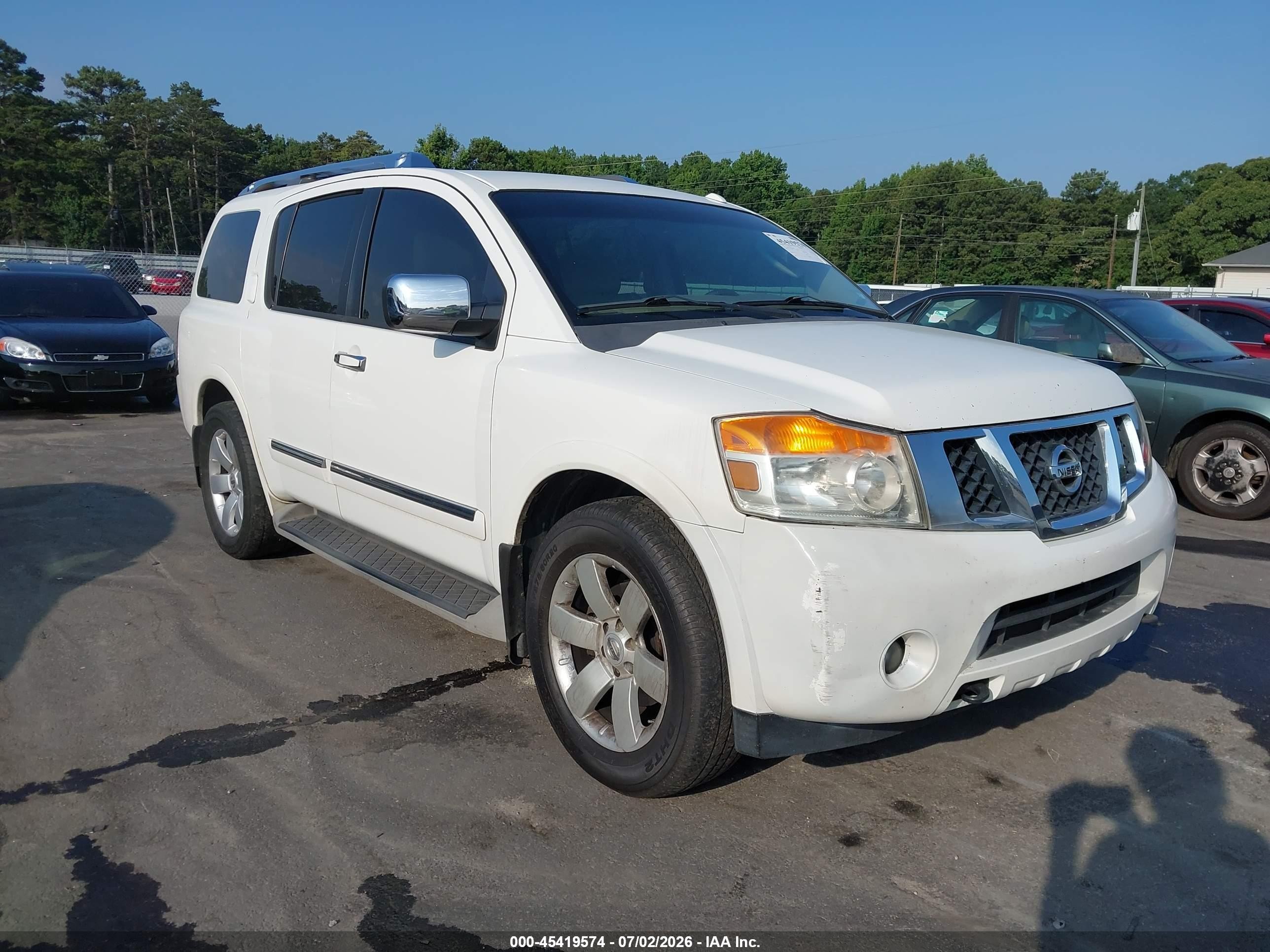2011 Nissan Armada SL, VIN 5N1BA0ND3BN623888 — Бок