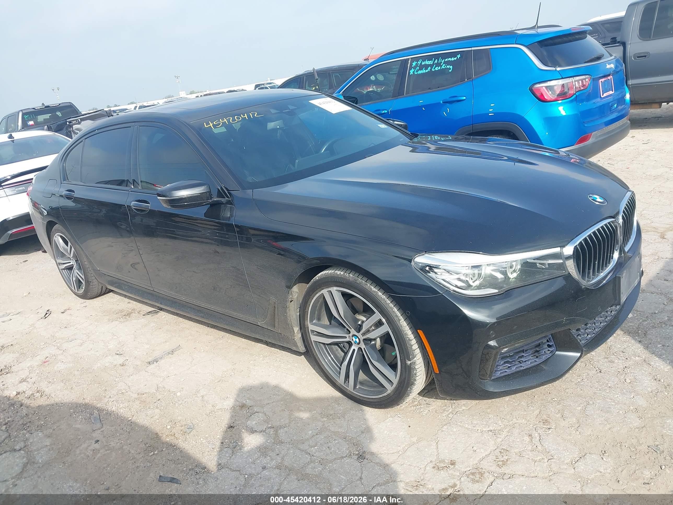 2016 BMW 7 Series 740i, VIN WBA7E2C58GG548085 — Normal wear
