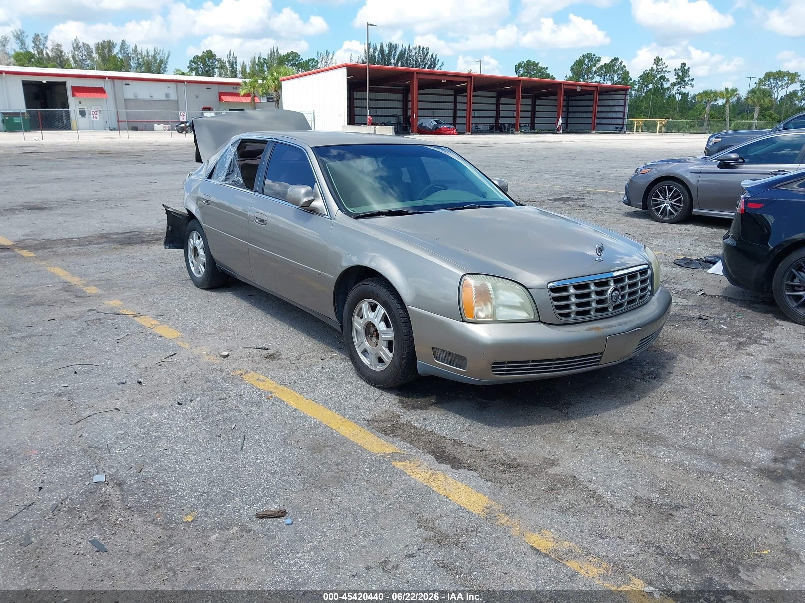 2002 Cadillac DeVille Livery, VIN 1G6KD54Y32U257906 — Rear end
