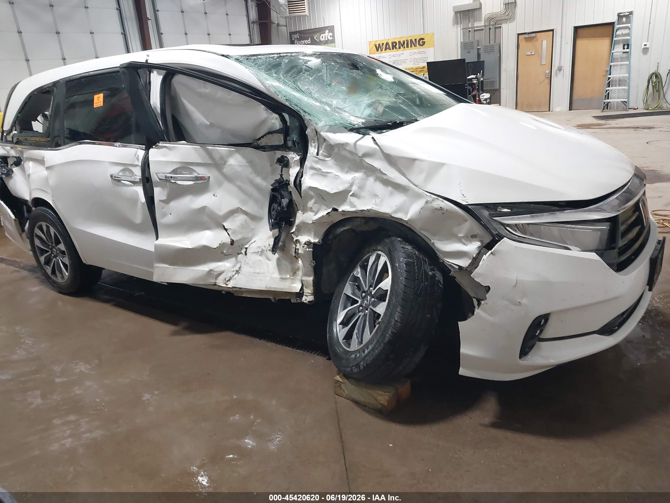 2021 Honda Odyssey EX-L, VIN 5FNRL6H70MB026110 — Side