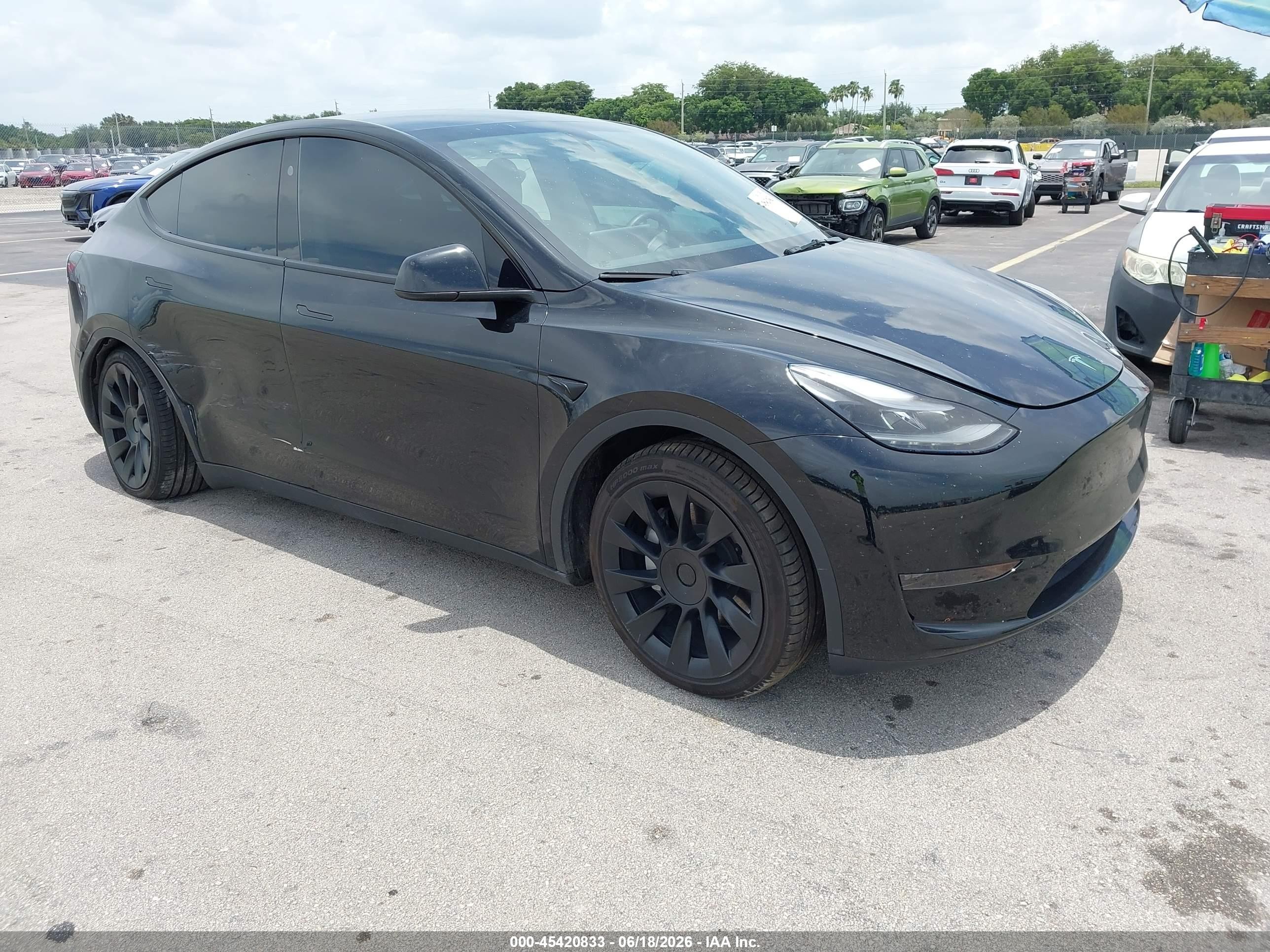 2024 Tesla Model Y, VIN 7SAYGDED7RF035203 — Rear end