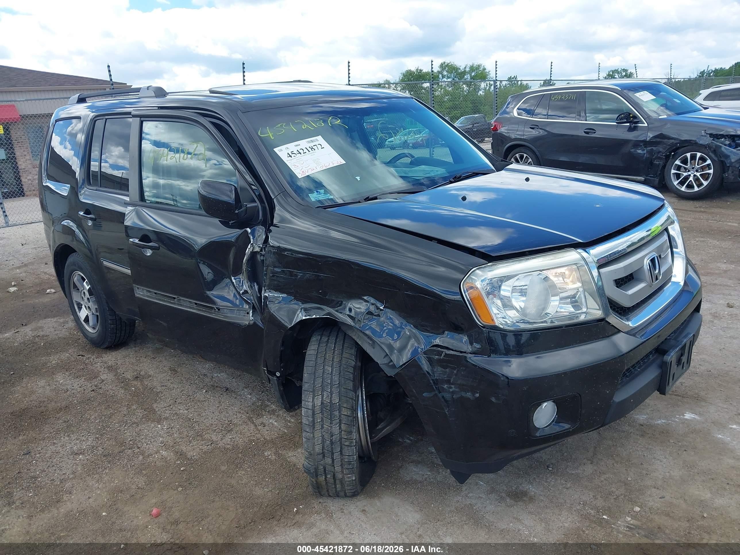 2011 Honda Pilot Touring, VIN 5FNYF4H91BB056965 — Undercarriage