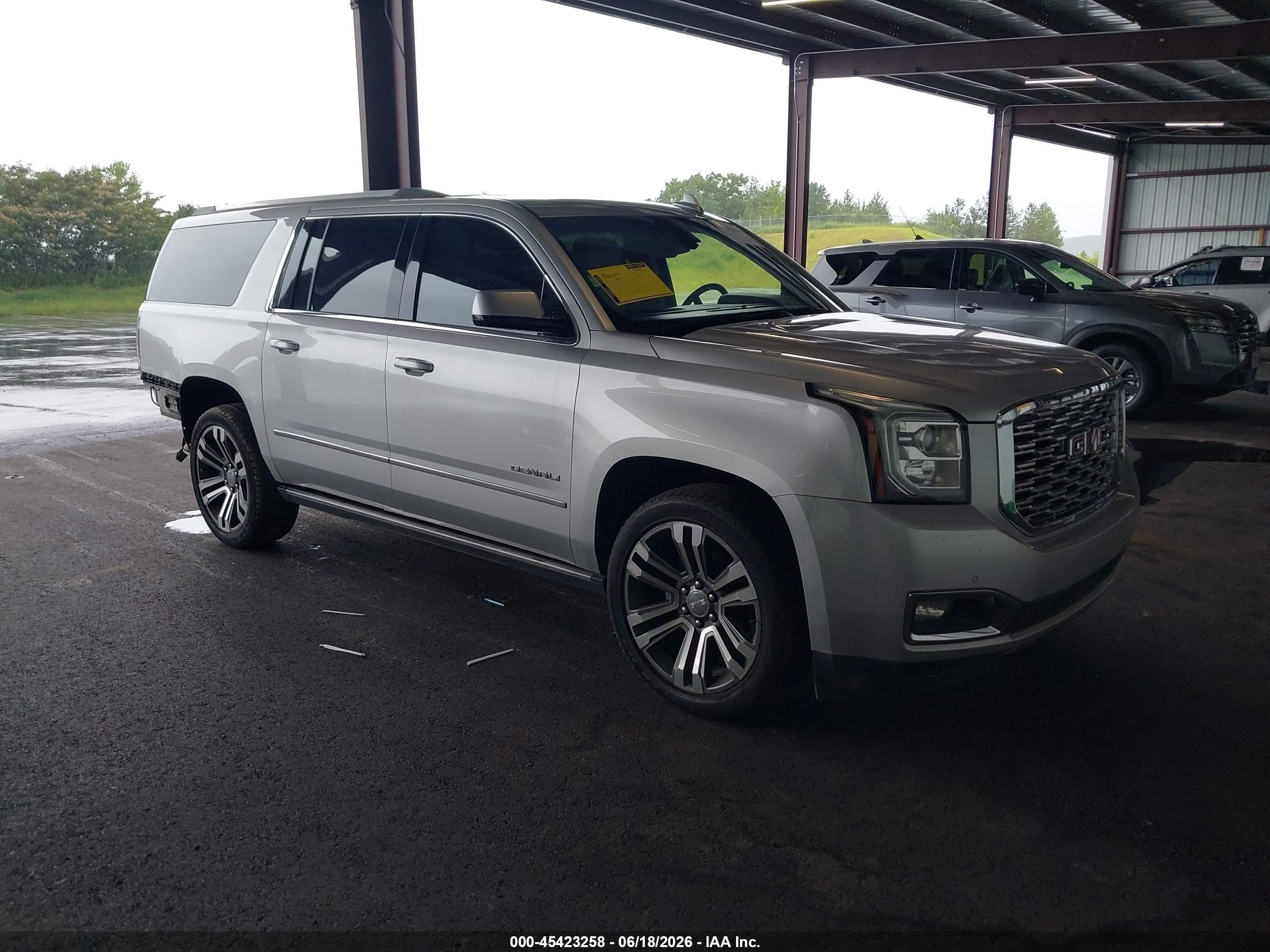 2018 GMC Yukon XL Denali, VIN 1GKS1HKJ7JR393491 — Rear end