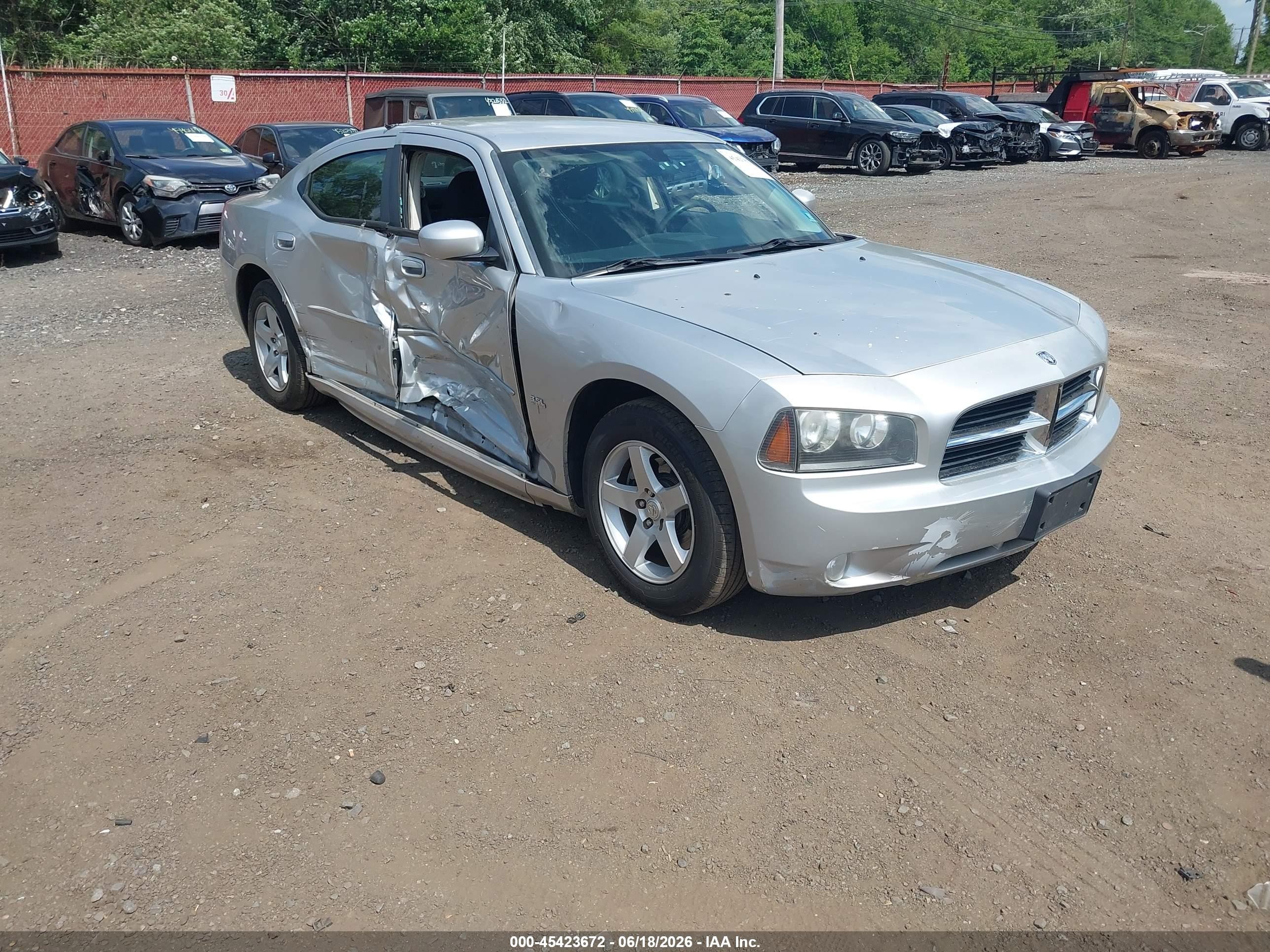 2010 Dodge Charger SXT, VIN 2B3CA3CV5AH184949 — Side