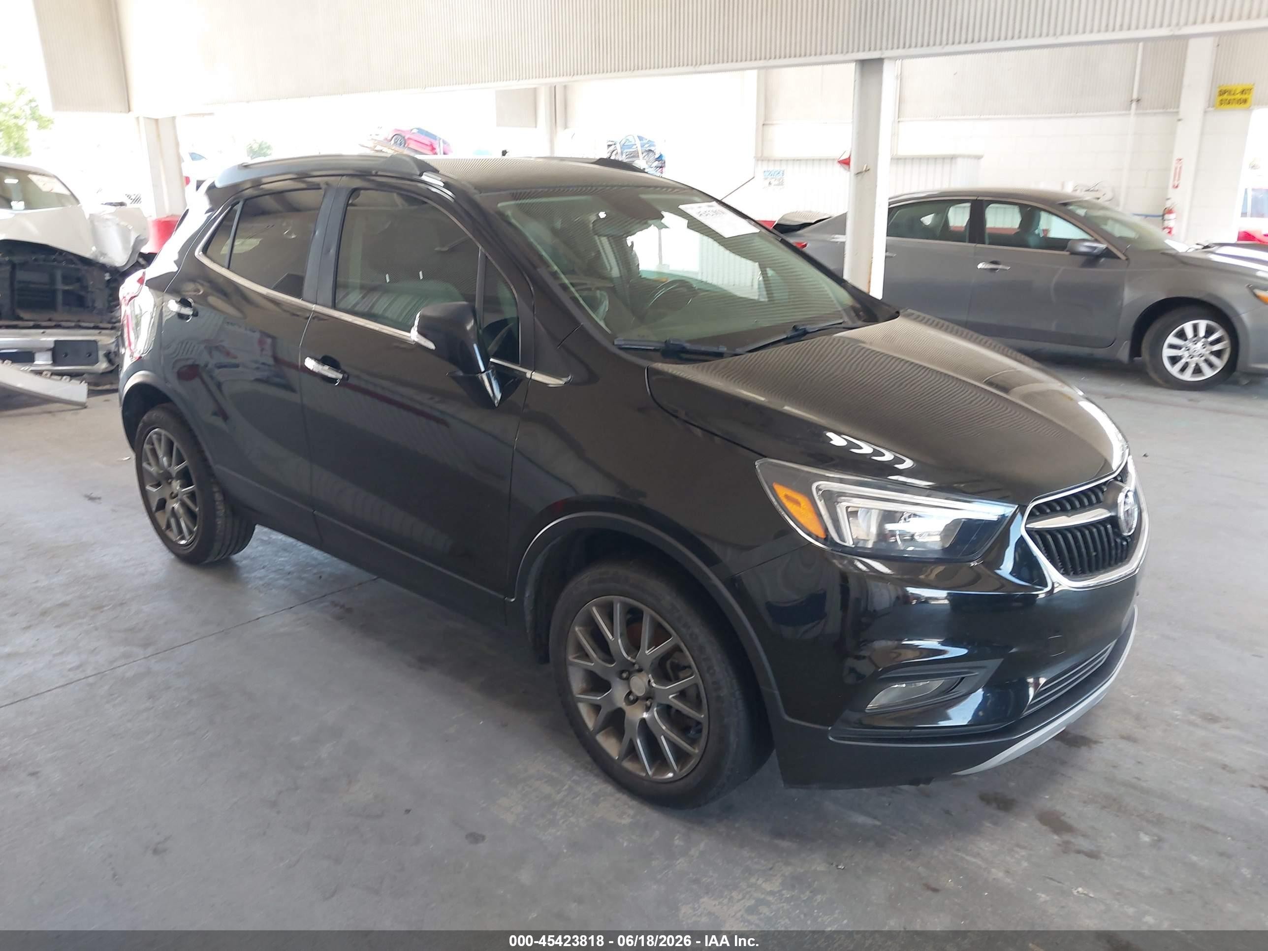2019 Buick Encore Sport Touring, VIN KL4CJ1SBXKB790620 — Side