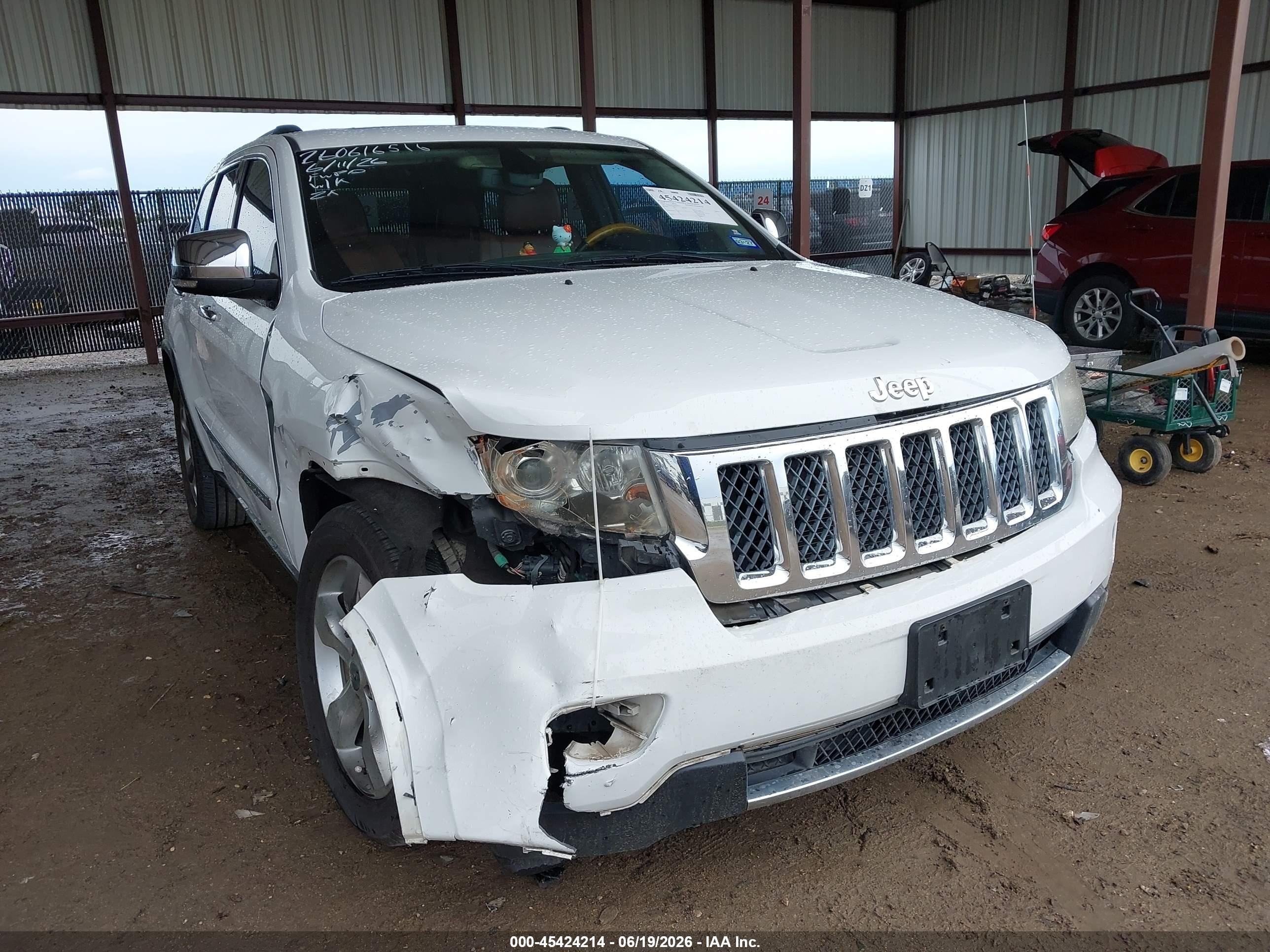 2013 Jeep Grand Cherokee Overland, VIN 1C4RJFCT1DC646472 — Front end