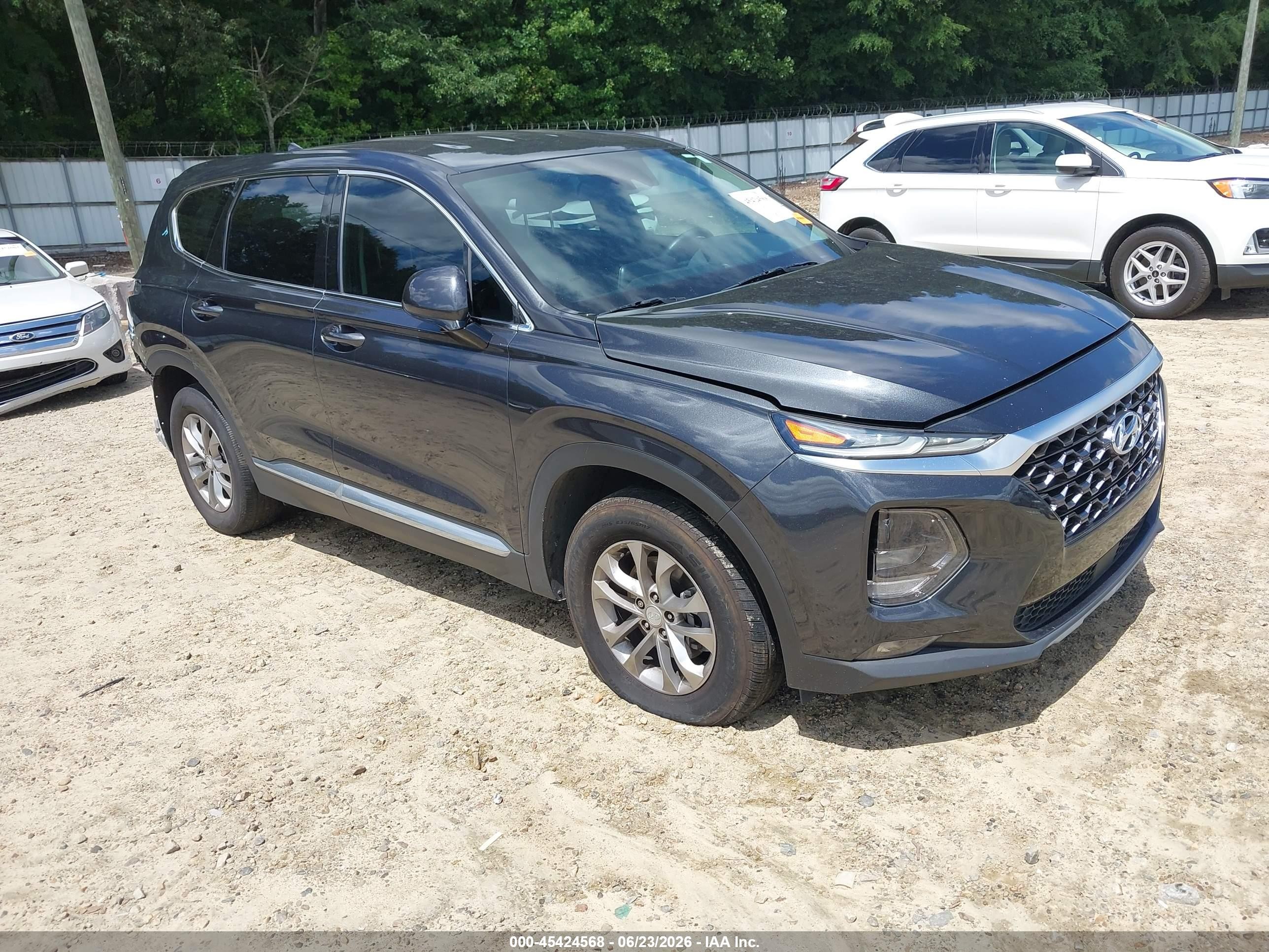 2020 Hyundai Santa Fe SEL, VIN 5NMS33AD6LH189499 — Rear end