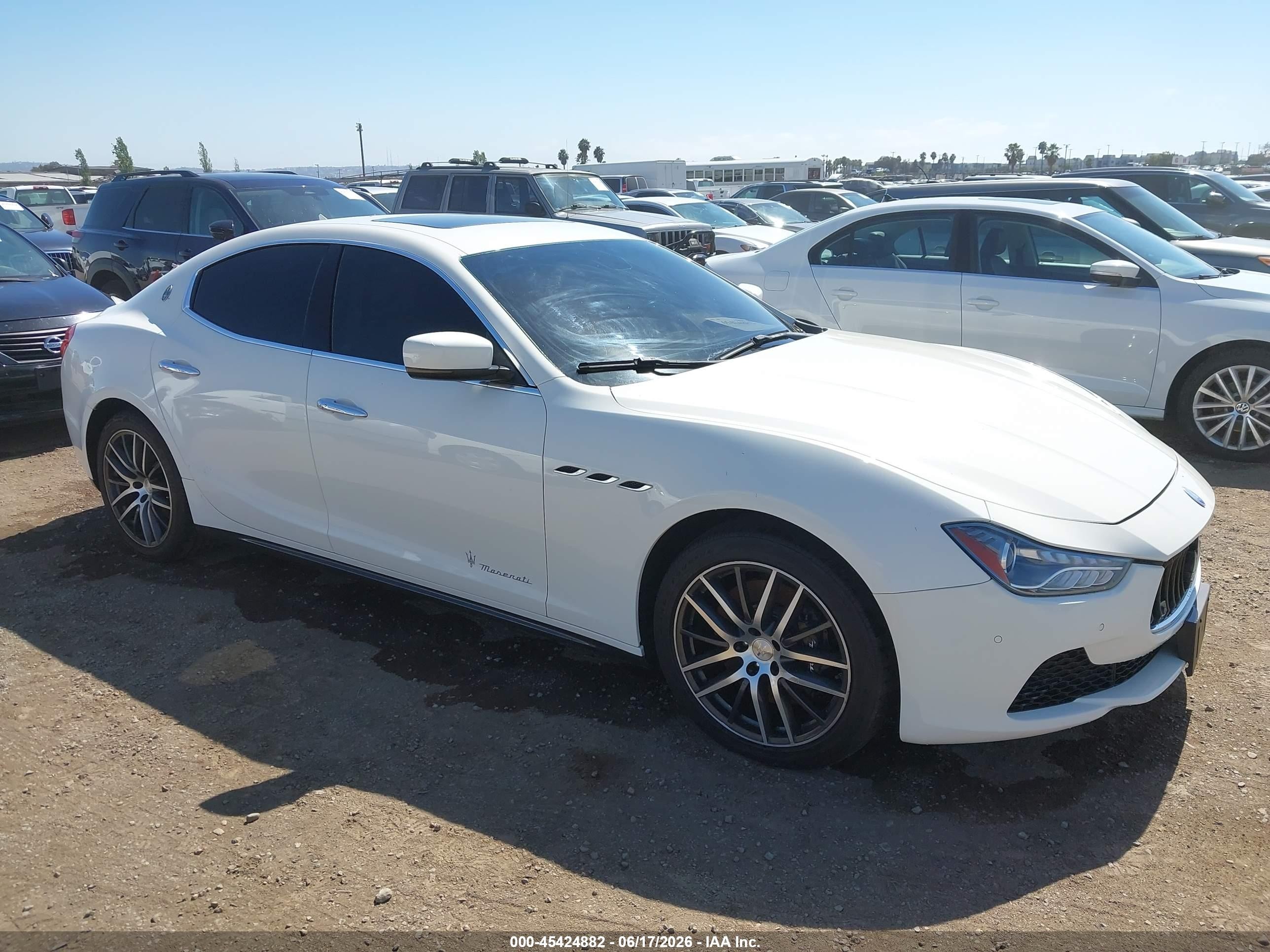 2015 Maserati Ghibli, VIN ZAM57XSA0F1131895 — Normal wear