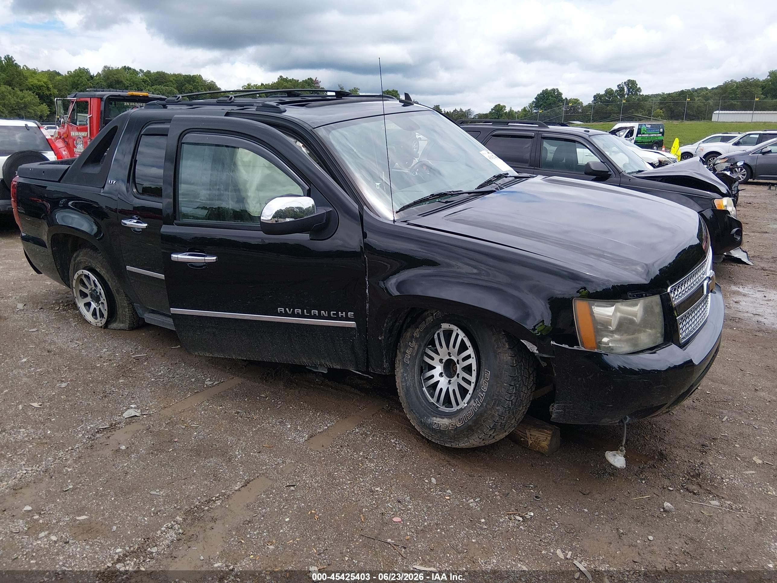 2011 Chevrolet Avalanche LTZ, VIN 3GNTKGE36BG257785 — Rollover