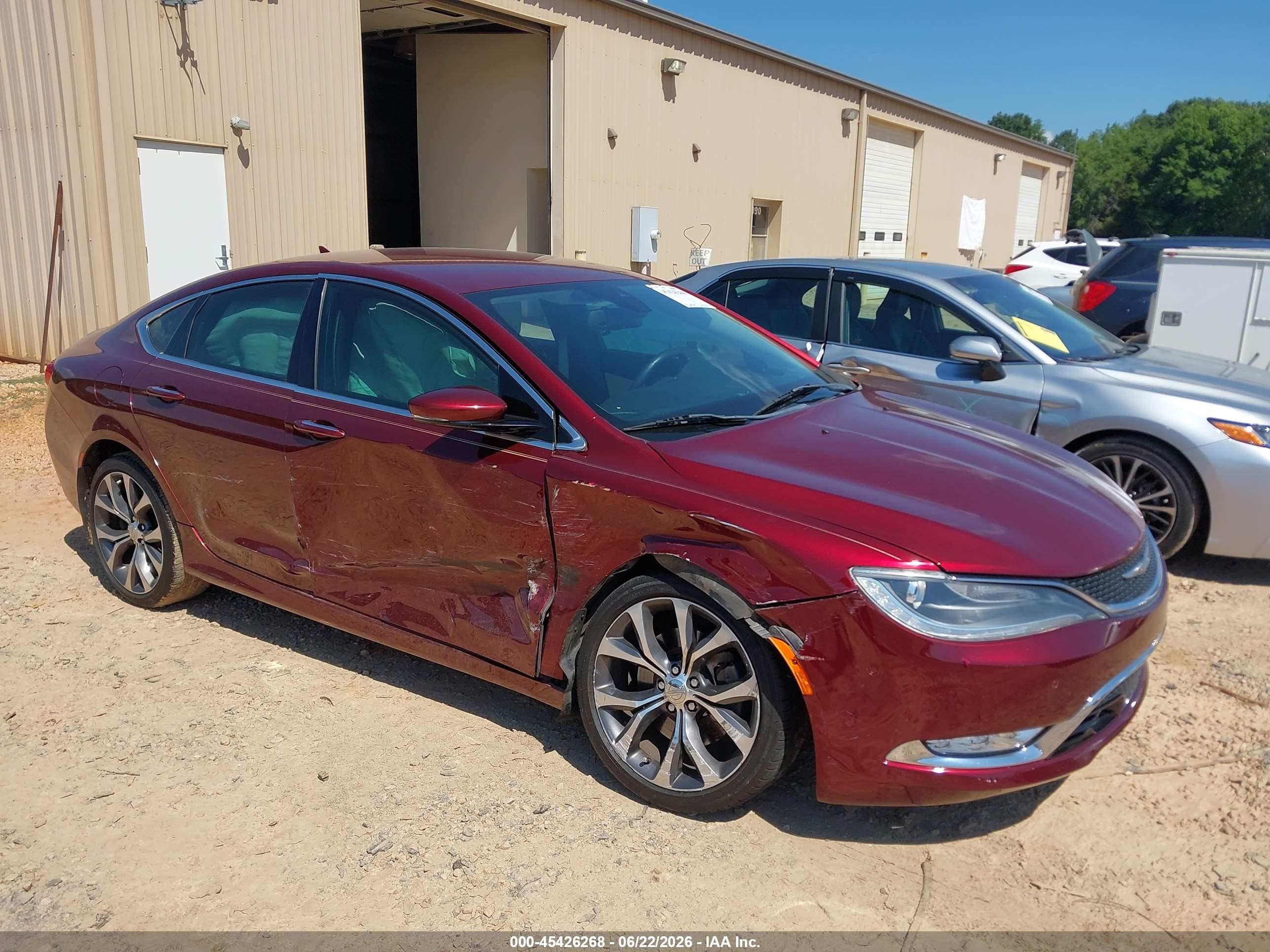 2015 Chrysler 200 C, VIN 1C3CCCCG2FN641360 — Side