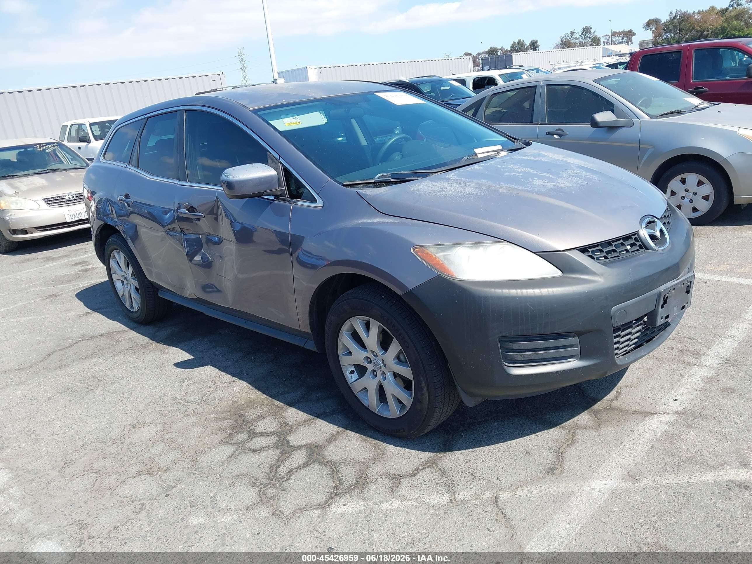 2009 Mazda CX-7 Touring, VIN JM3ER29L090236012 — Side