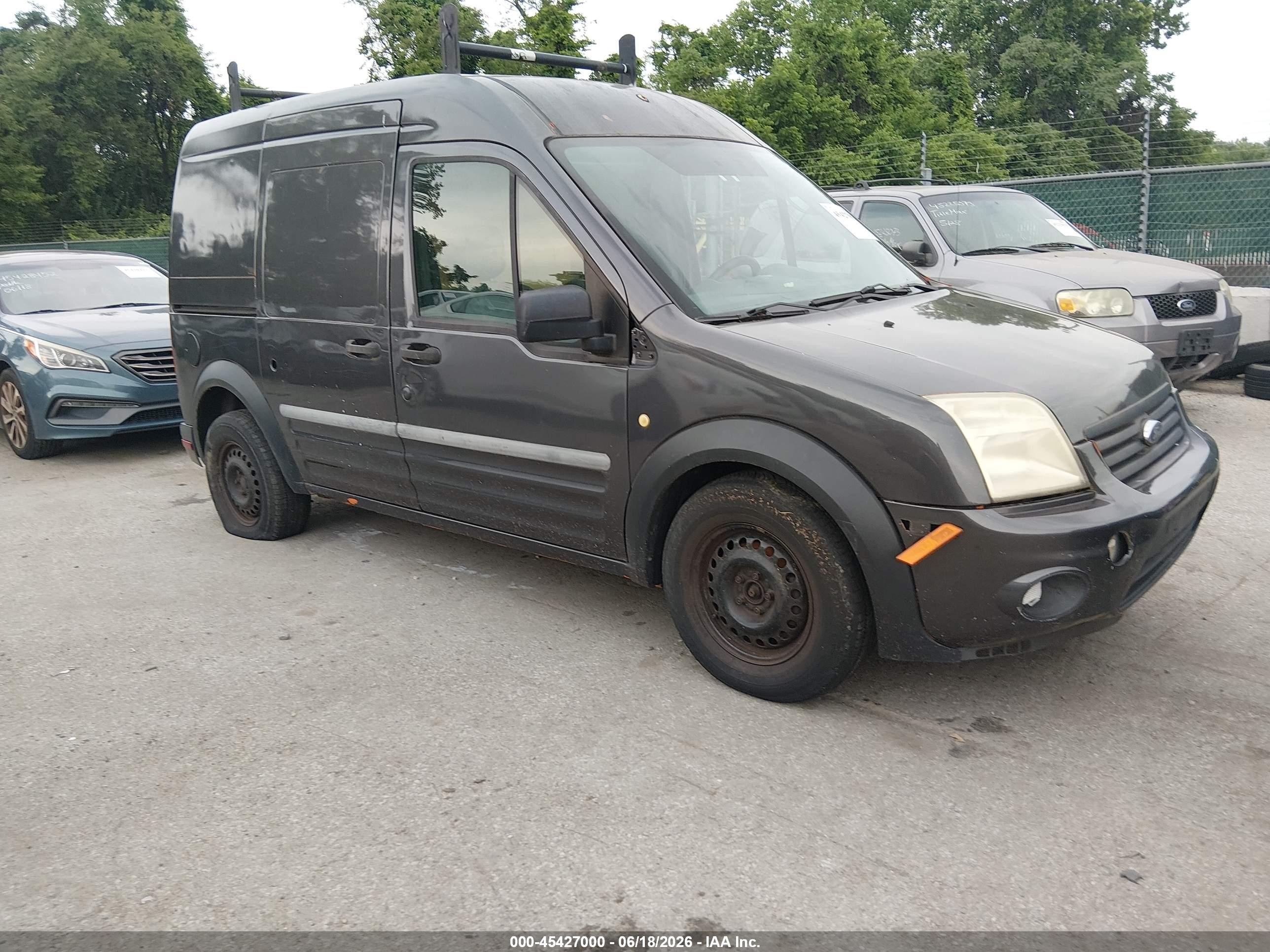 2010 Ford Transit Connect XLT, VIN NM0LS7BN3AT034035 — Normal wear