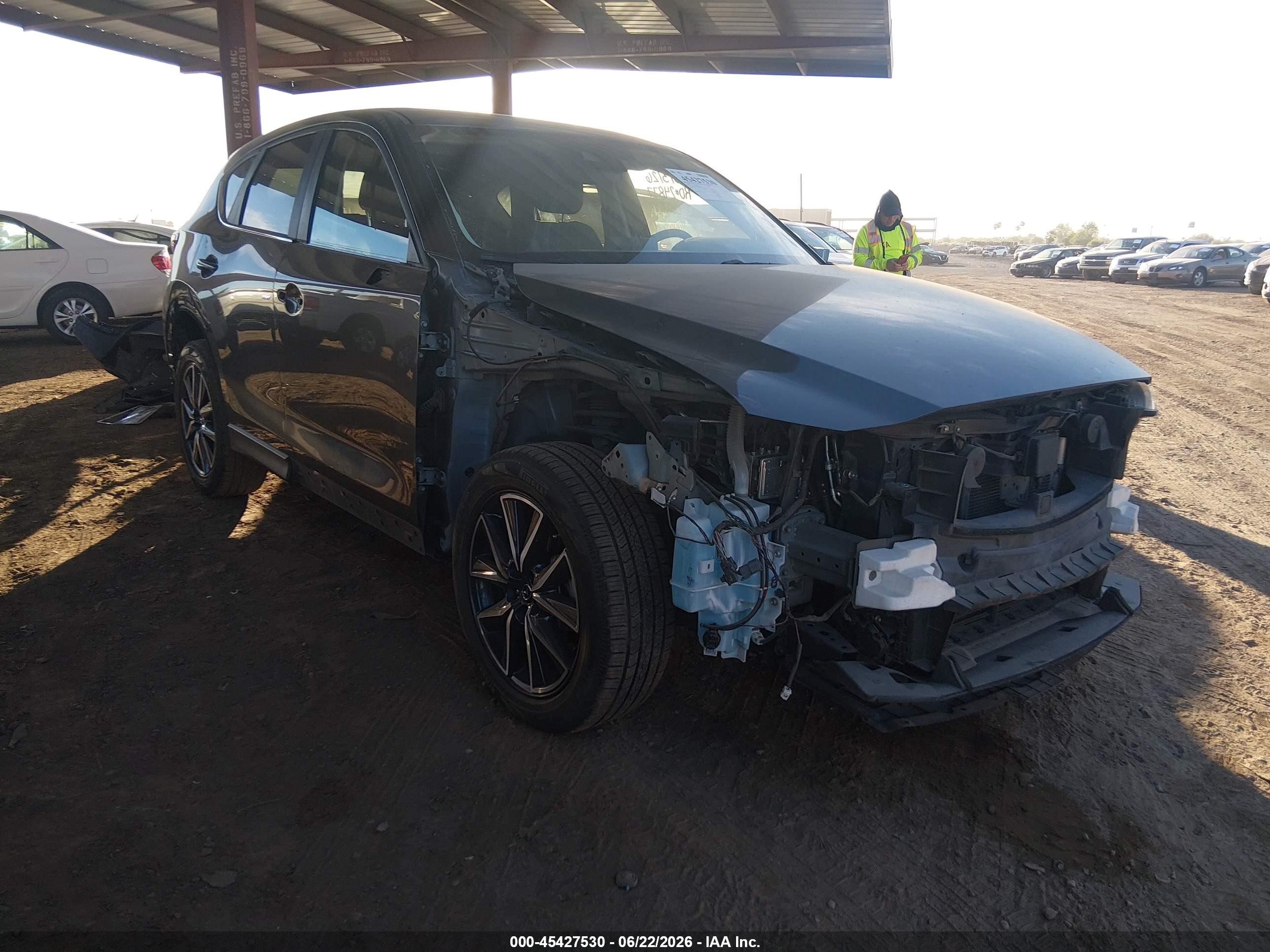 2018 Mazda CX-5 Touring, VIN JM3KFACM7J0401680 — Front end