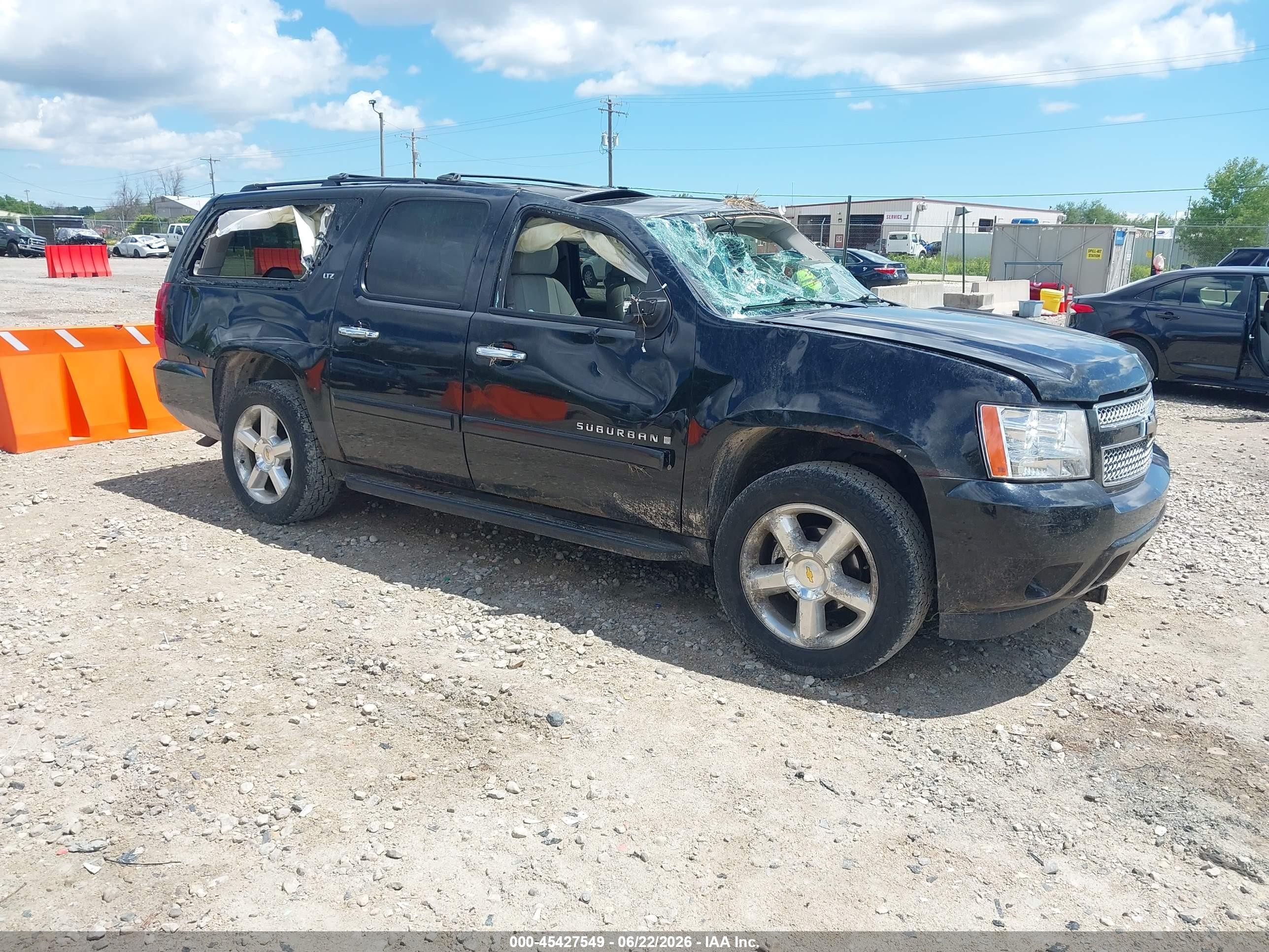 2008 Chevrolet Suburban LTZ, VIN 1GNFK16338J214392 — Rollover